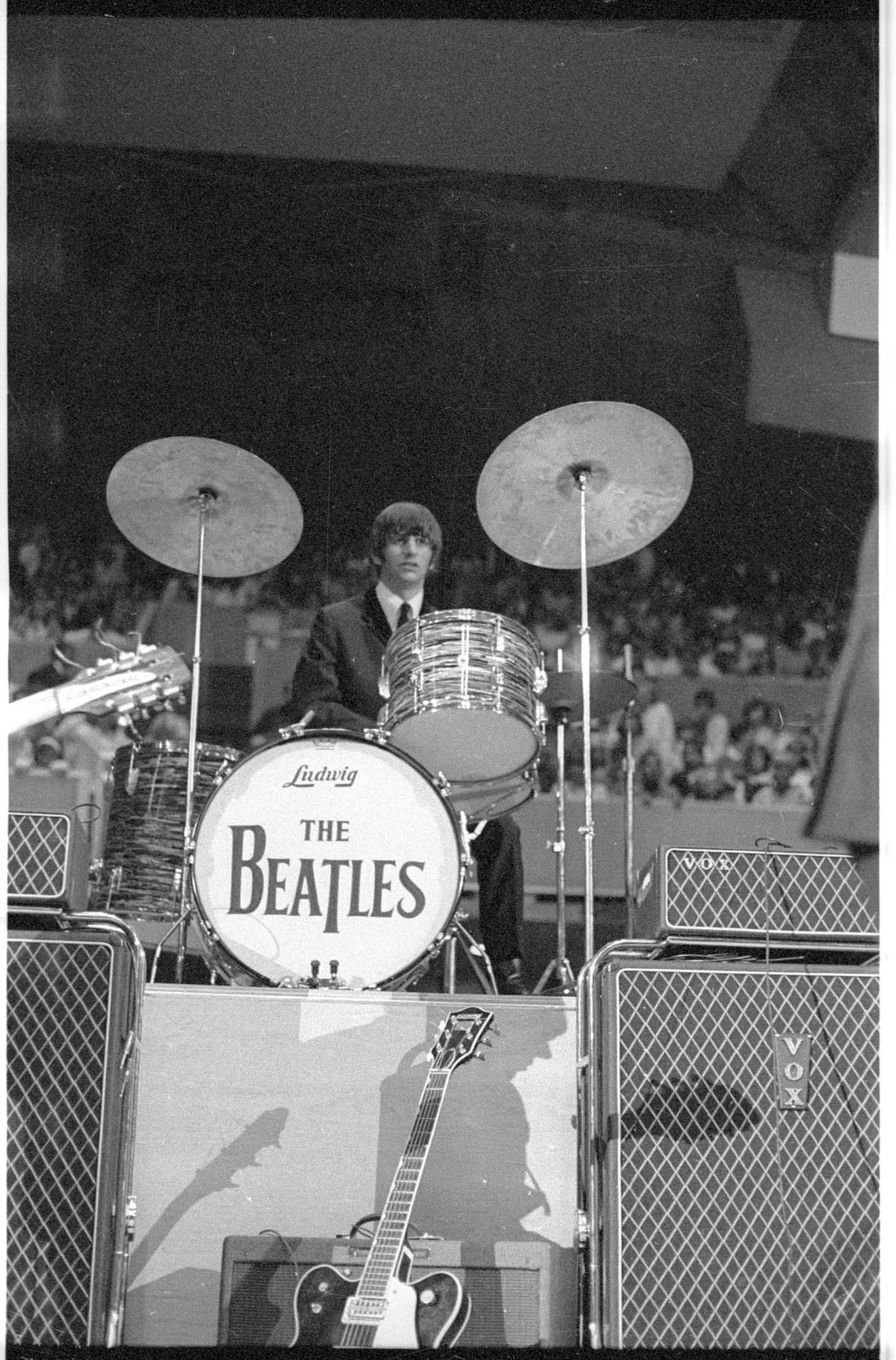 Image of Ringo Starr performing at the Beatles concert in Seattle Center Coliseum, August 21, 1964