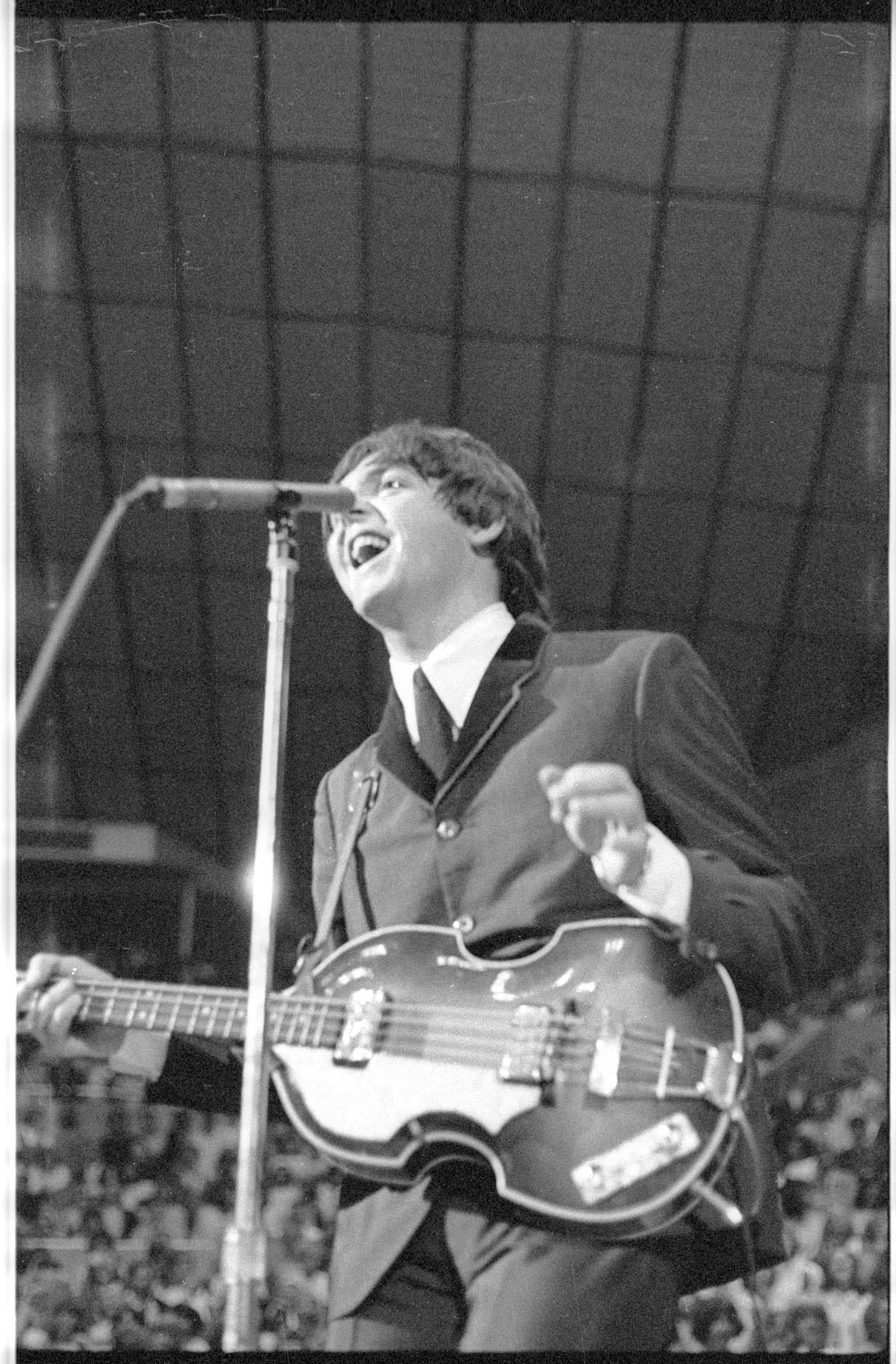 Image of Paul McCartney singing at the Beatles concert, Seattle Center Coliseum, August 21, 1964