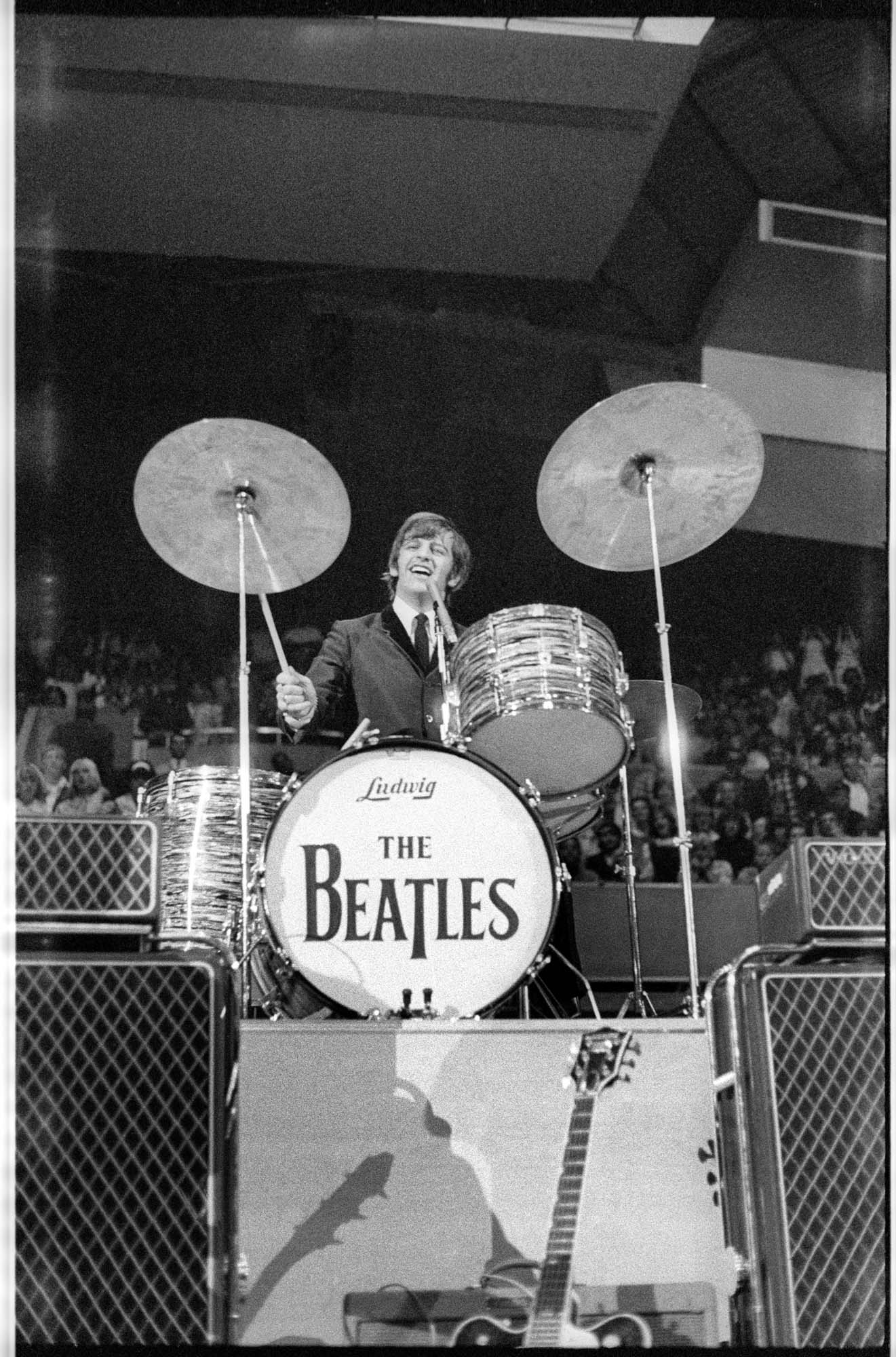 Image of Ringo Starr performing at the Beatles concert at Seattle Center Coliseum, August 21, 1964