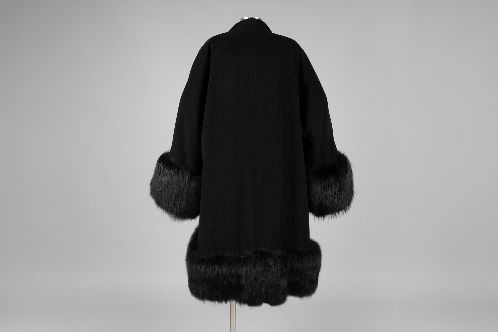 Image of Black coat with fur trim from Best's Apparel, ca. 1940s