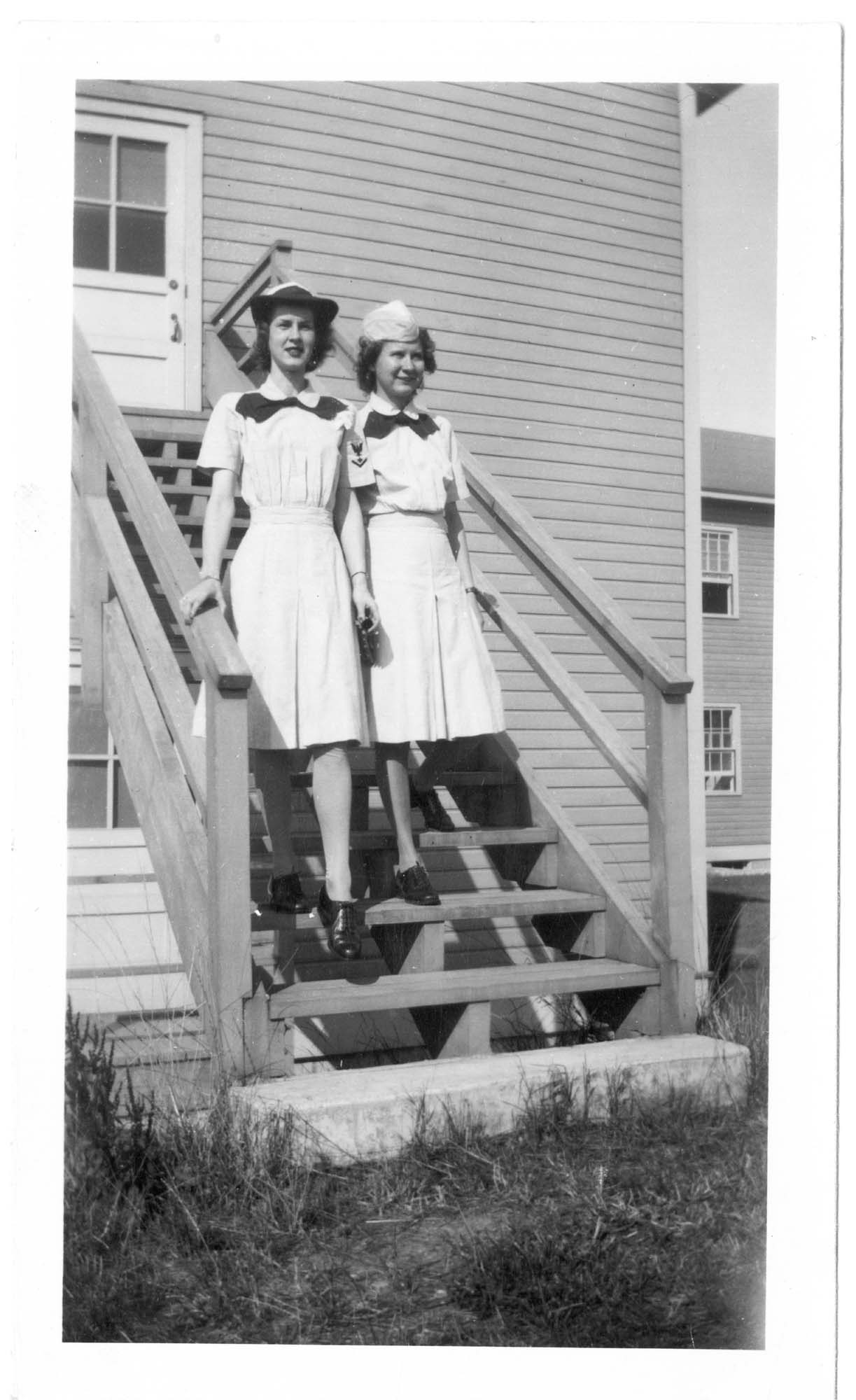 Image of Laura Burnham and another woman in WAVES uniforms, circa 1945