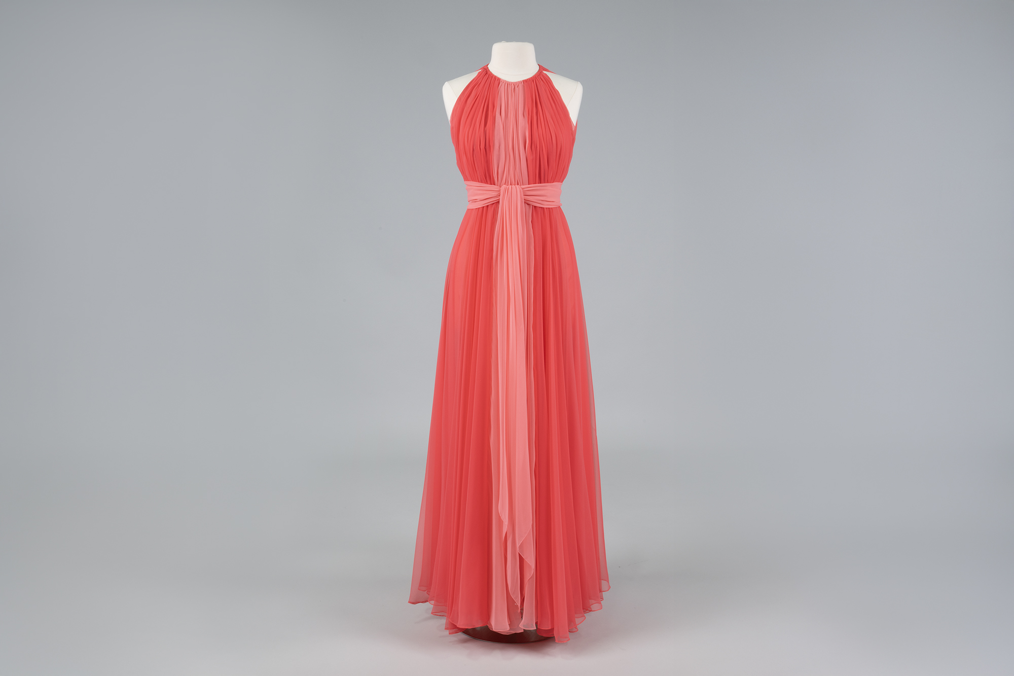 Image of Pink chiffon gown and cape designed by Kiki Hart, 1970s