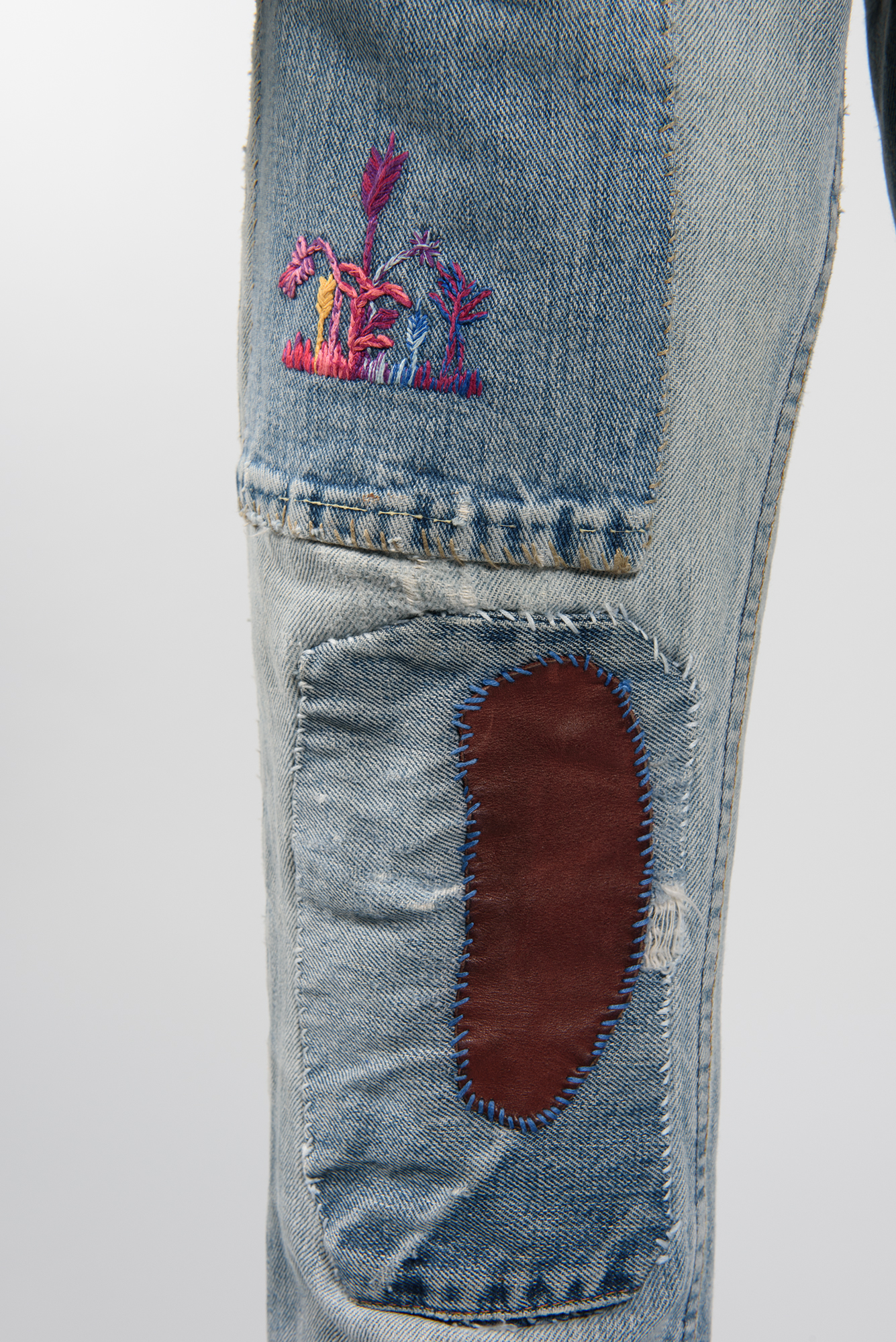 Image of Pair of bell-bottom jeans with patches, 1968-1980