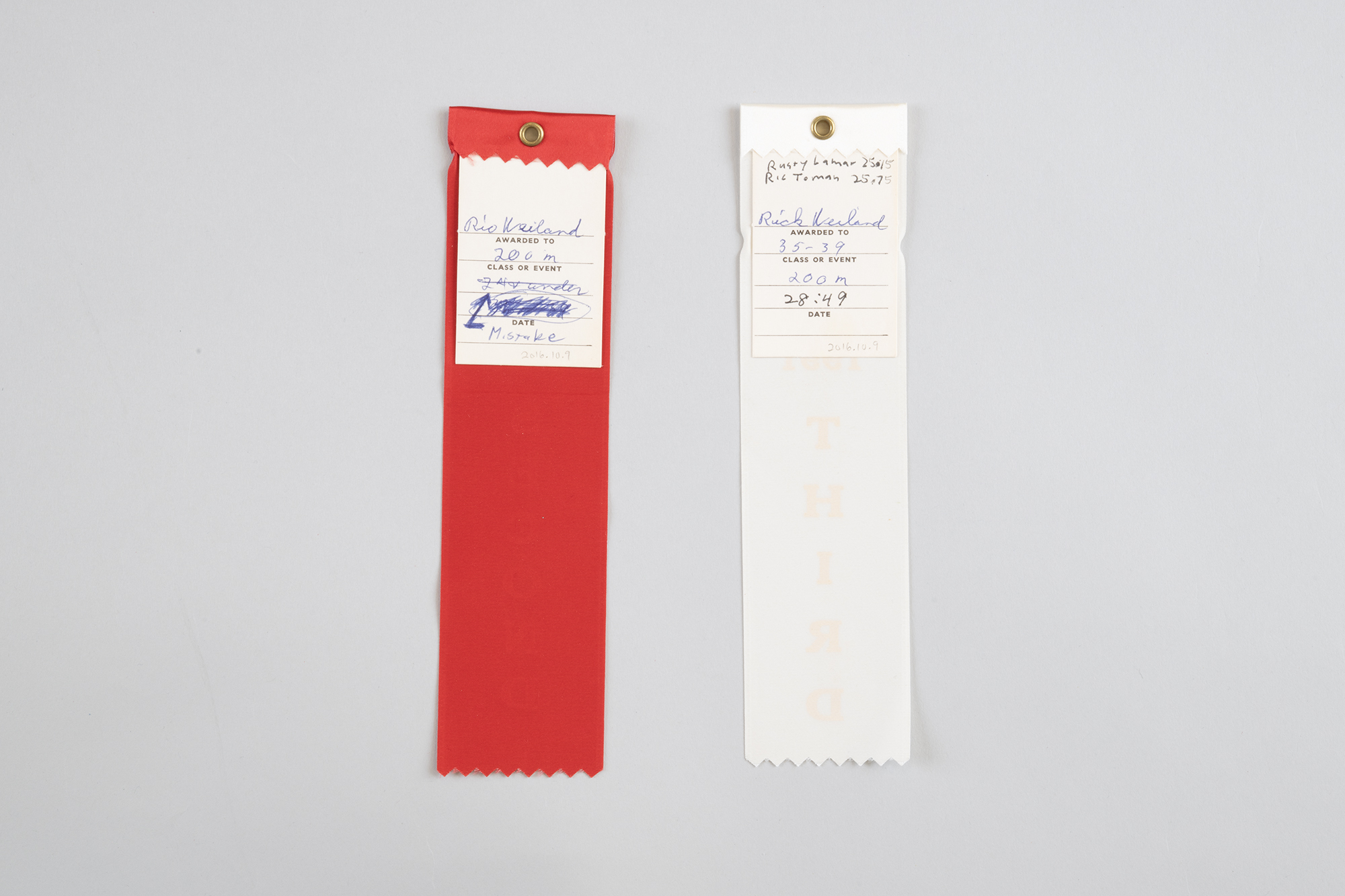 Image of Two ribbons won by Ric Weiland at the Northwest Gay/Lesbian Sports Festival, 1991