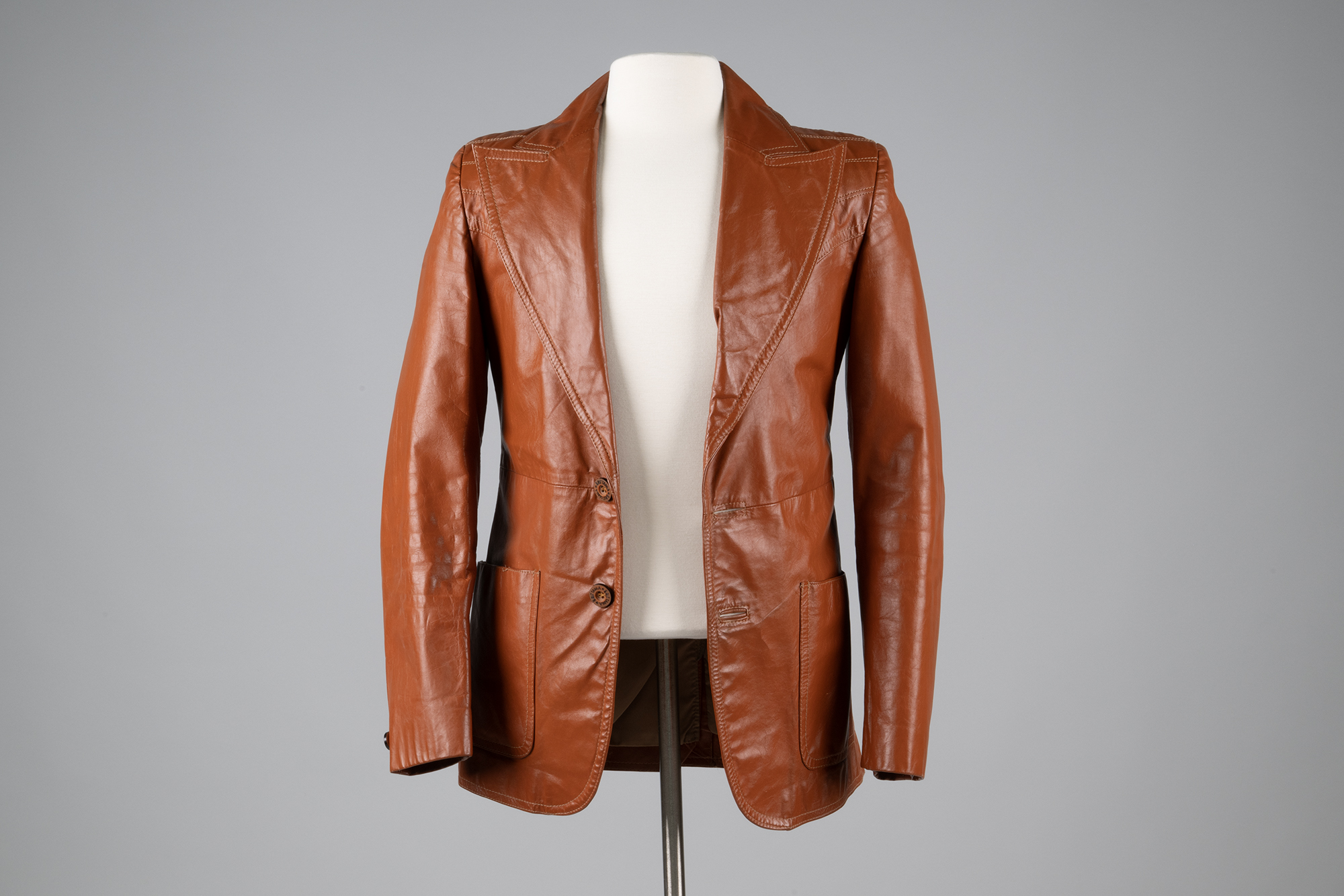 Image of Brown leather jacket made by Brittania, 1975-1979