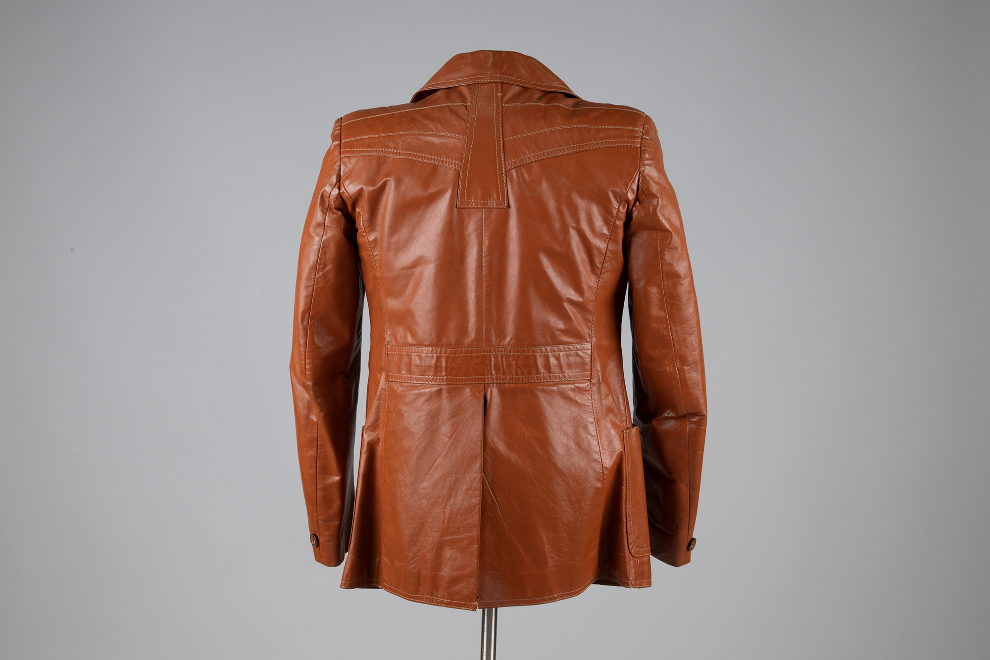 Image of Brown leather jacket made by Brittania, 1975-1979