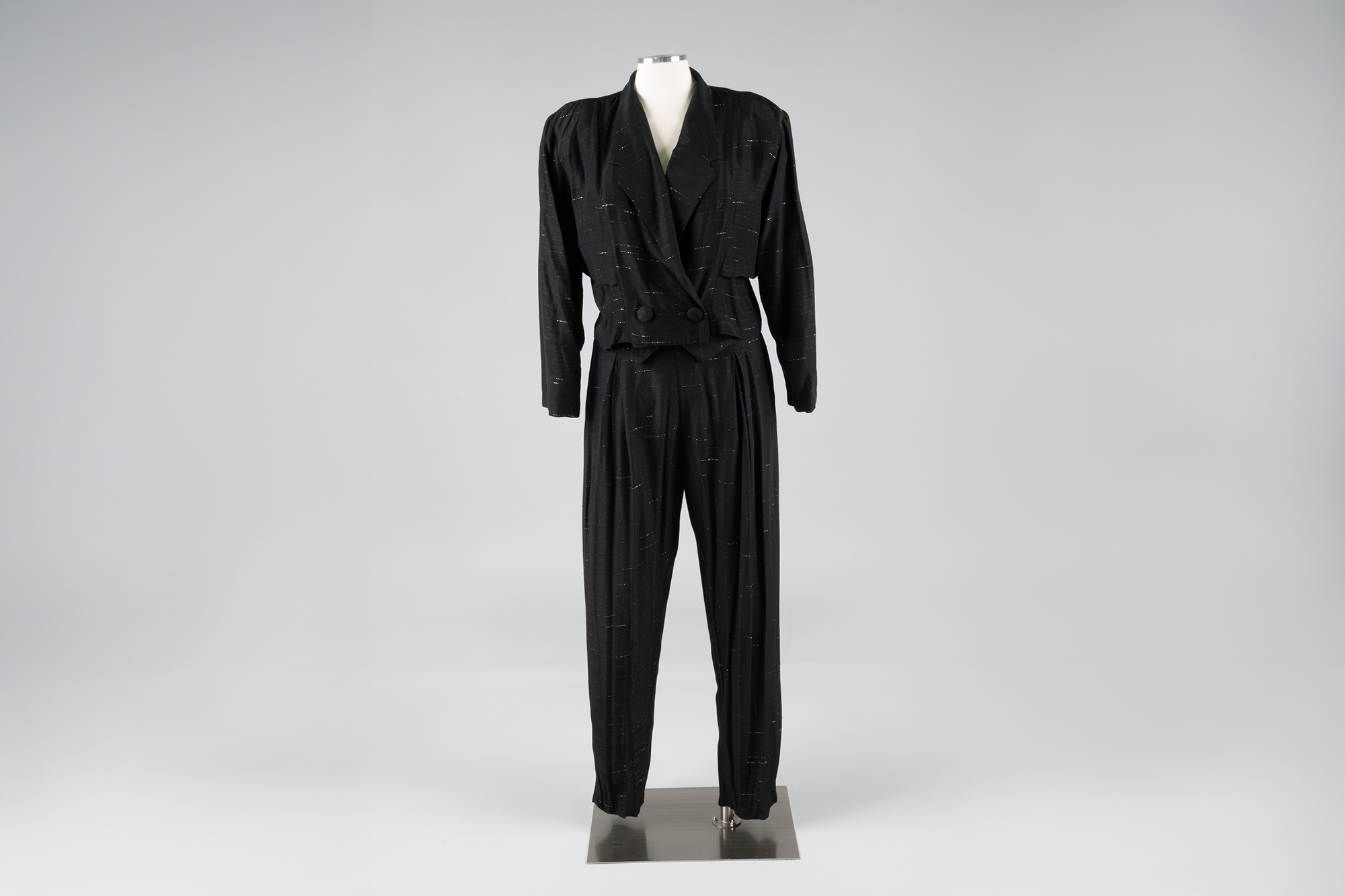Image of Black and gold evening suit, ca. 1988-1992