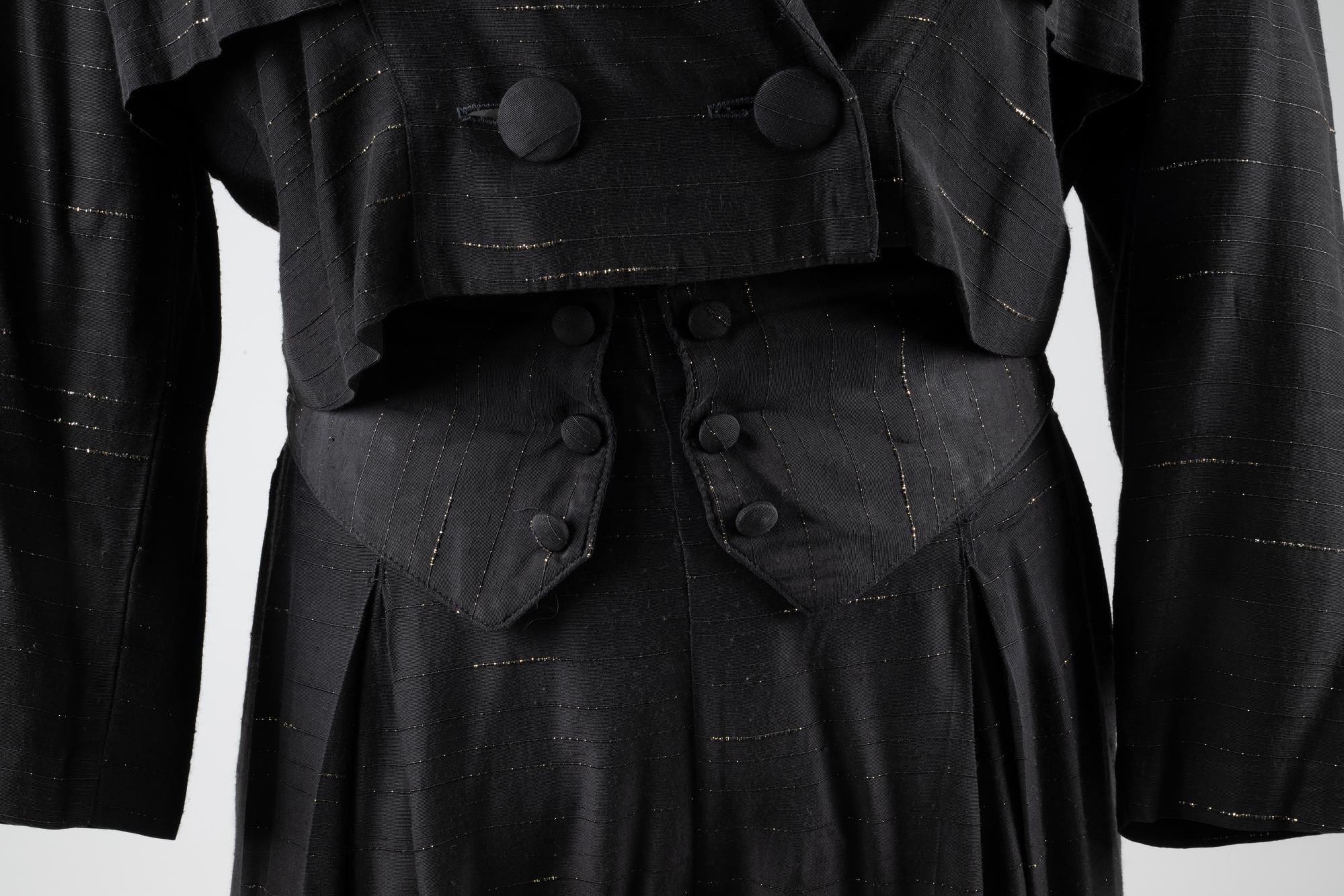 Image of Black and gold evening suit, ca. 1988-1992