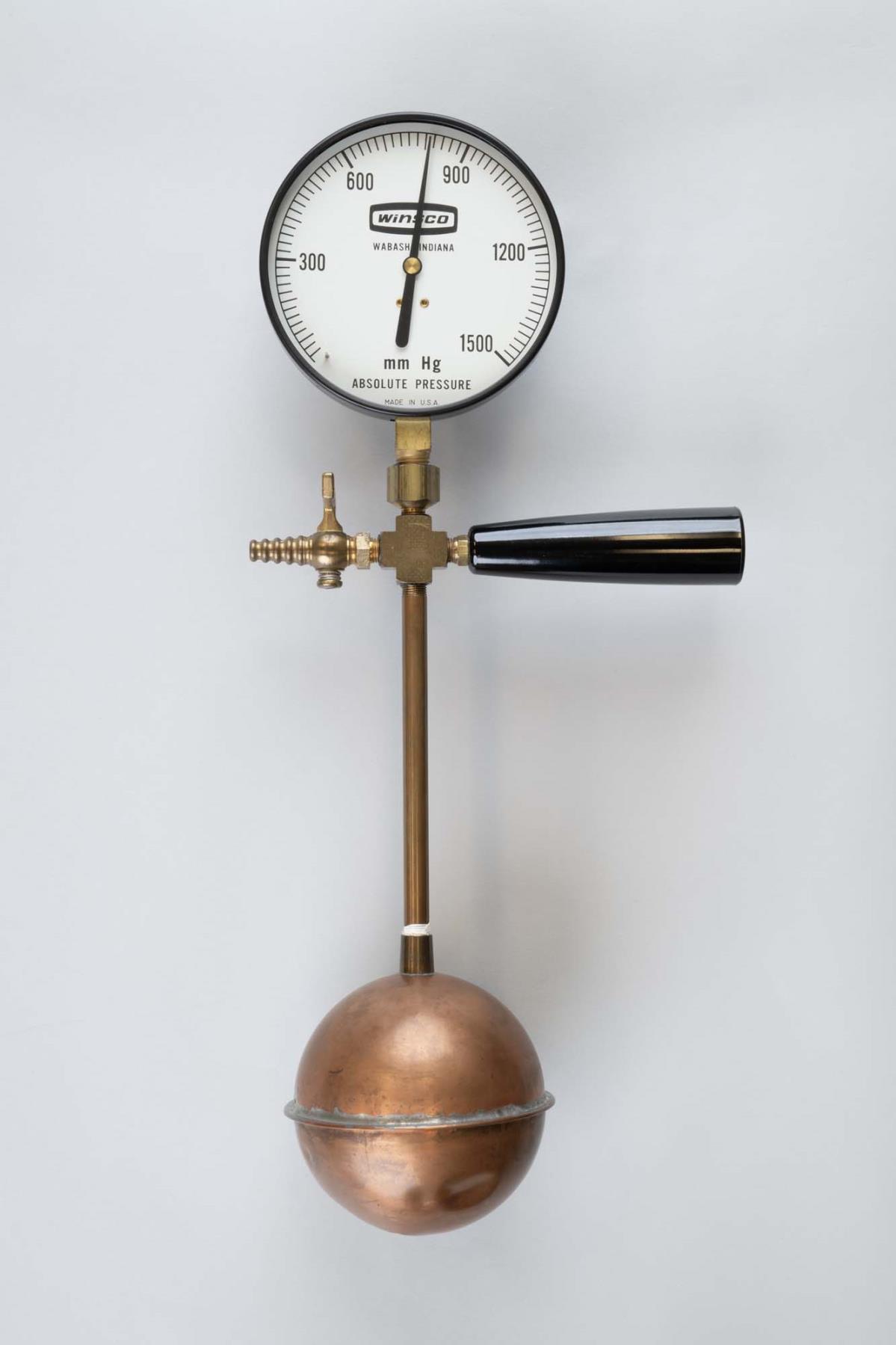 Image of Prop for demonstrating absolute zero, made of a metal toilet float, 1990s