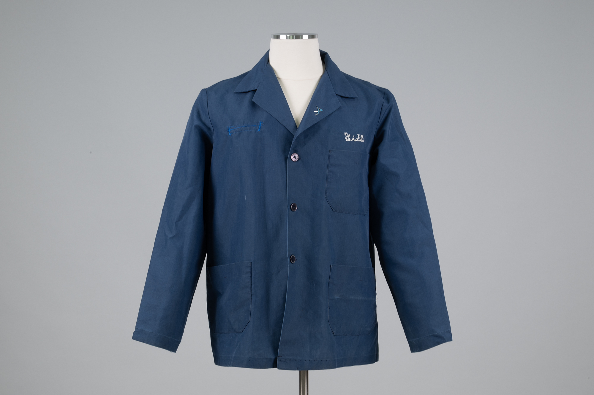 Image of Blue shop coat modified and worn by Bill Nye, 1980s