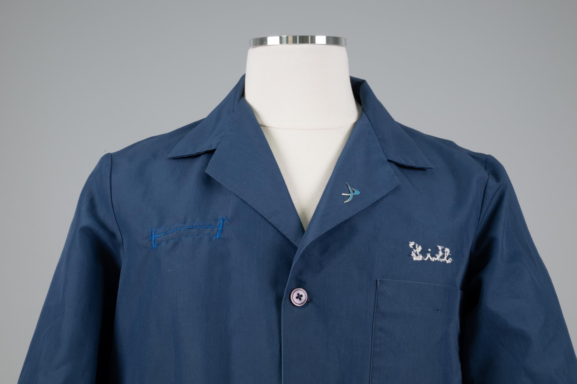 Image of Blue shop coat modified and worn by Bill Nye, 1980s