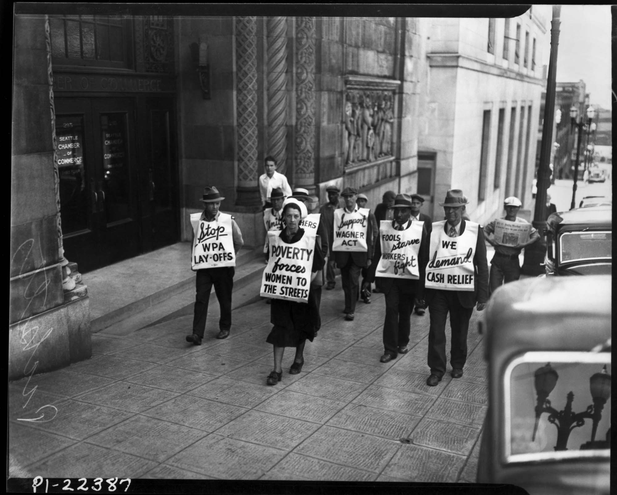 Image of Demonstrators with signs outside Seattle Chamber of Commerce during WPA strike, Seattle, 1937