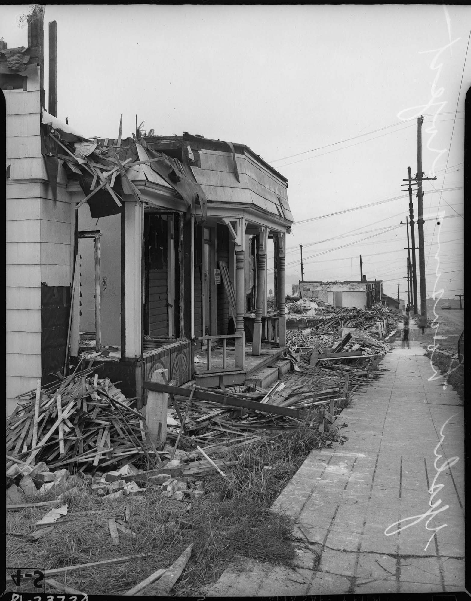 Image of Houses being demolished for Yesler Terrace housing project, Seattle, 1940