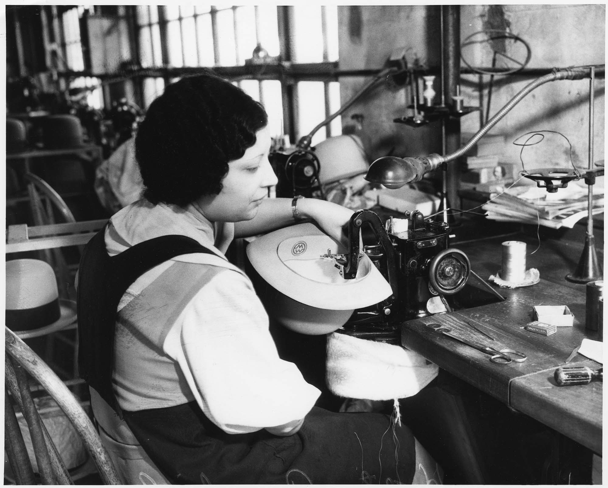 Image of Woman sewing a hat at the J.T. Hardeman  Hat Company, Seattle, 1935