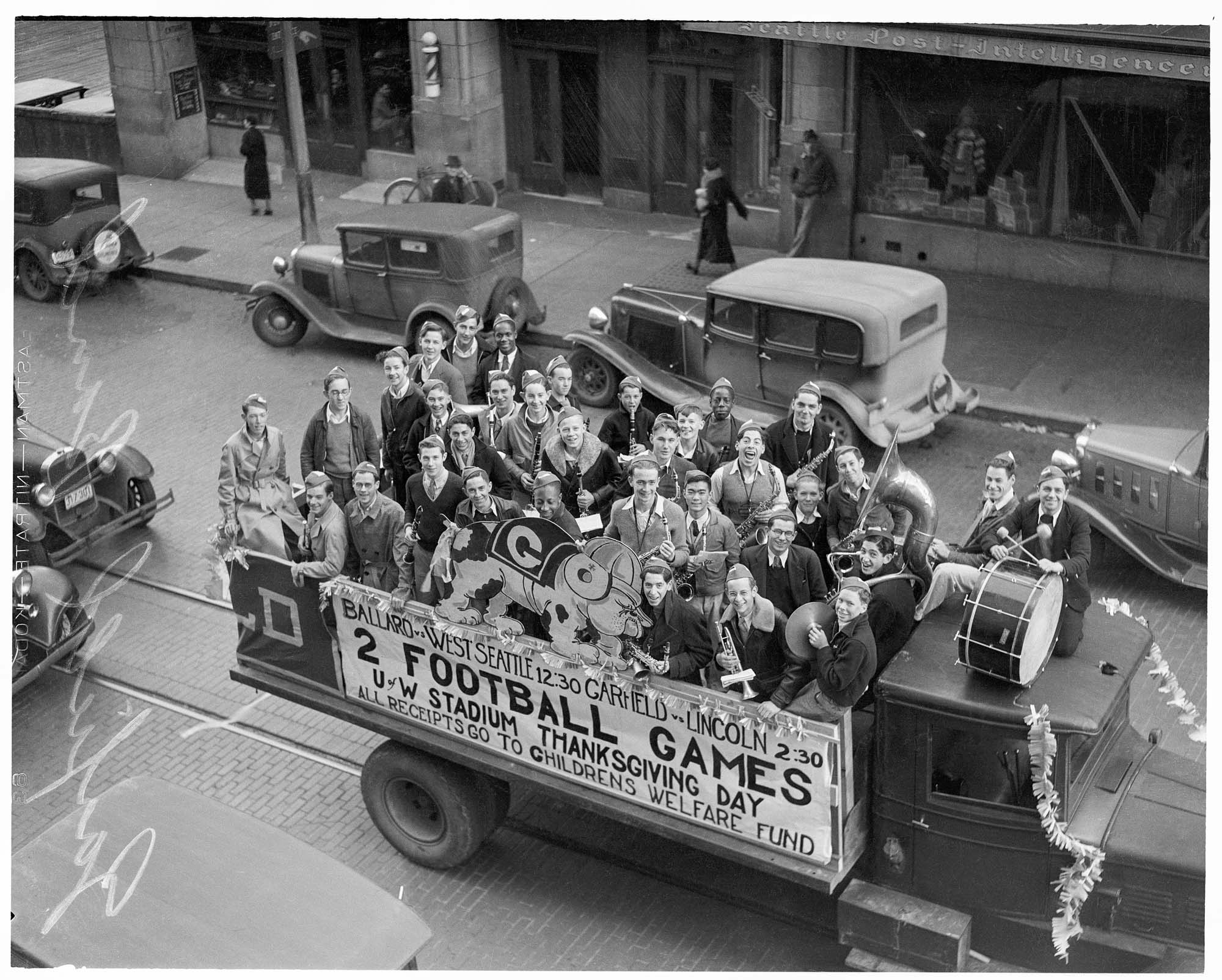 Image of Garfield High School band promoting Thanksgiving benefit football games, Seattle, 1935