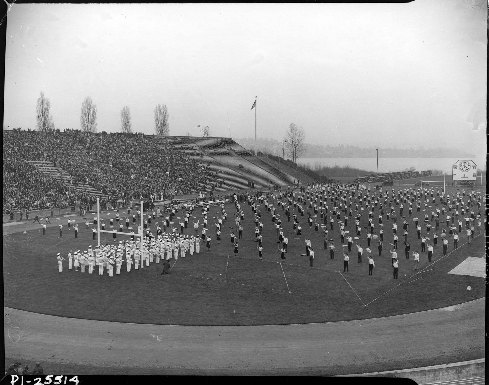 Image of Garfield High School band and drill team in Husky Stadium, Seattle, 1937