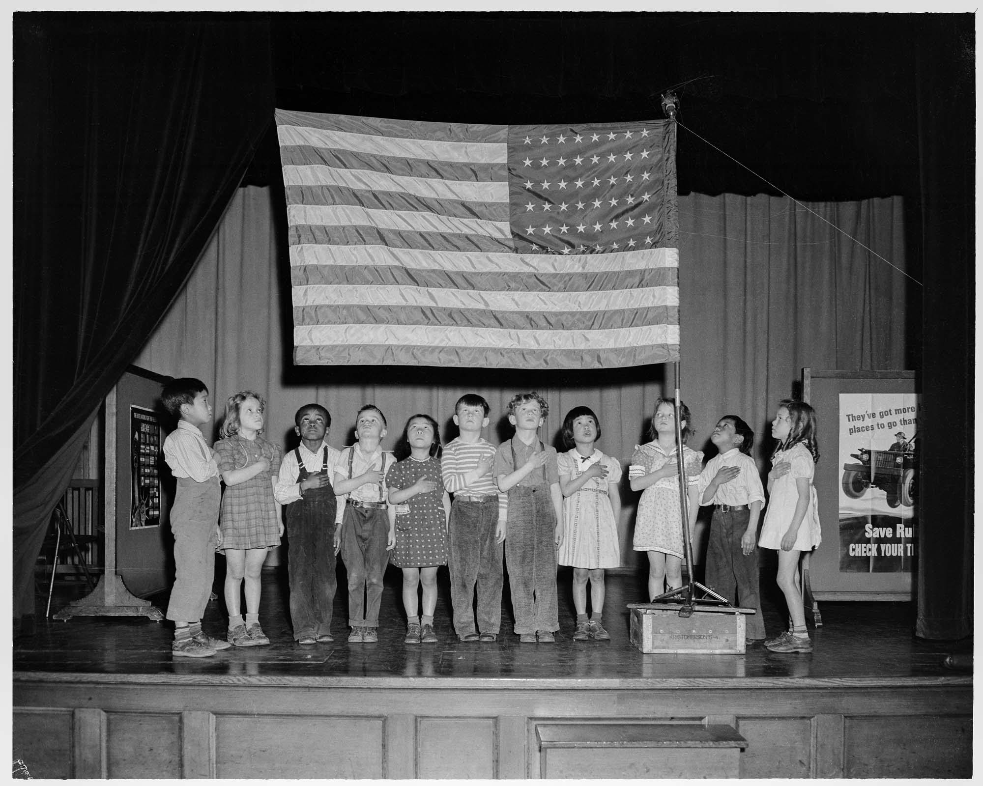Image of Bailey Gatzert School students salute flag, Seattle, May 18, 1943