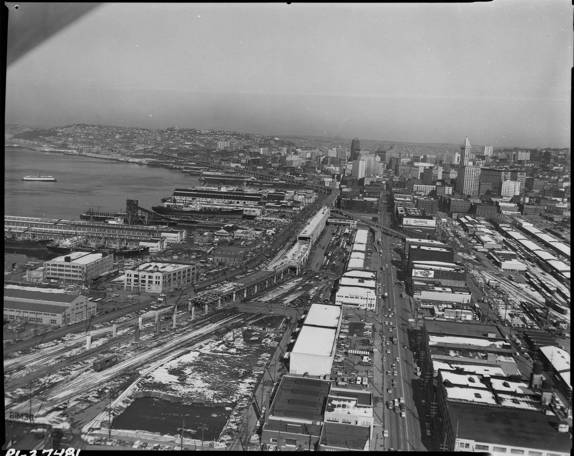 Image of Aerial view of Alaskan Way Viaduct under construction from south, Seattle, 1957