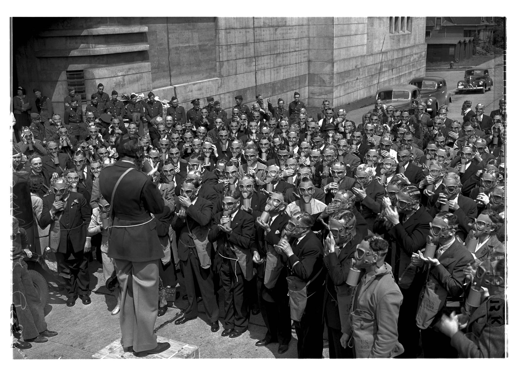 Image of Gas mask instruction in front of the Armory, Seattle, August 2, 1942