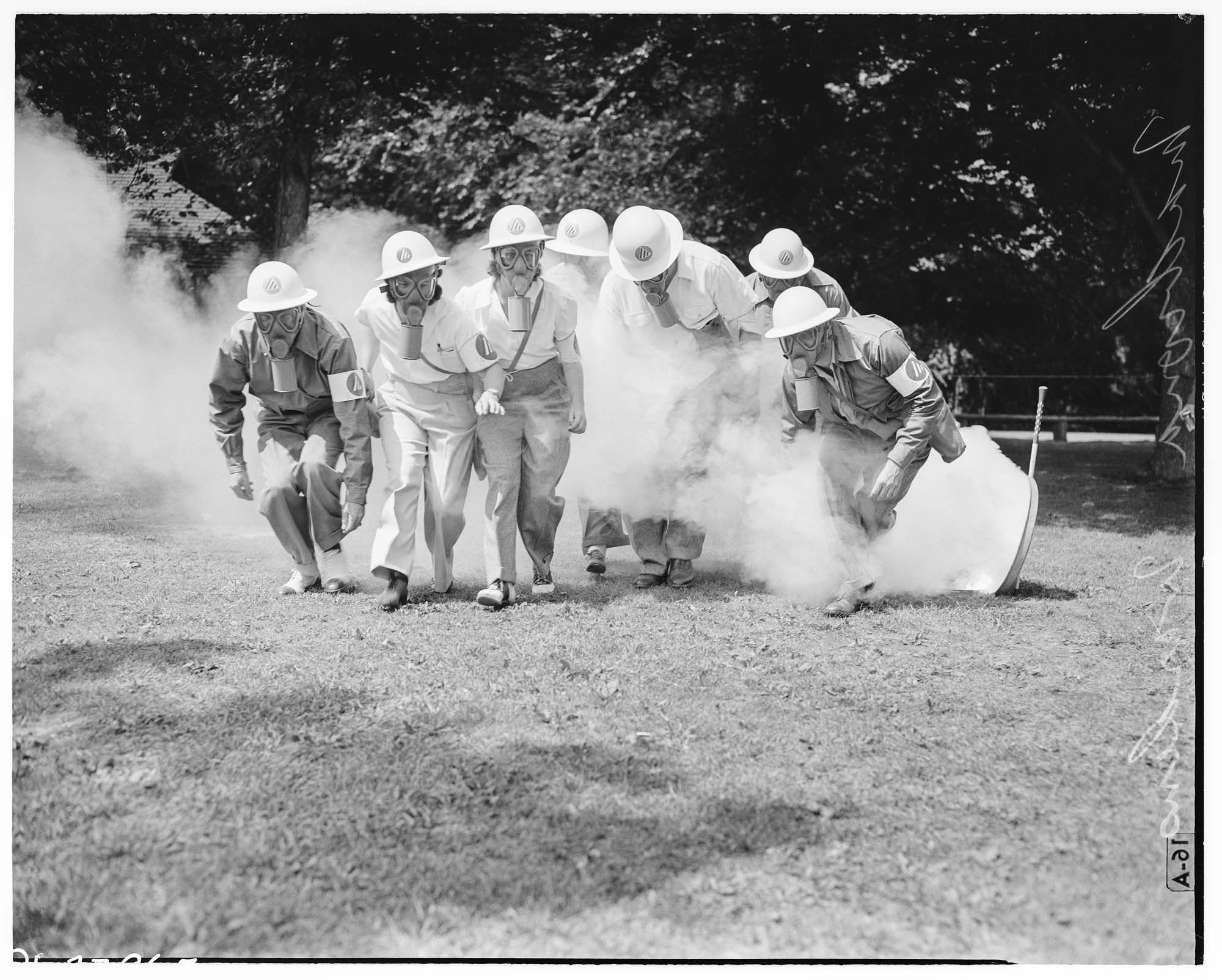 Image of Madrona air raid wardens drilling with gas masks, August 1942