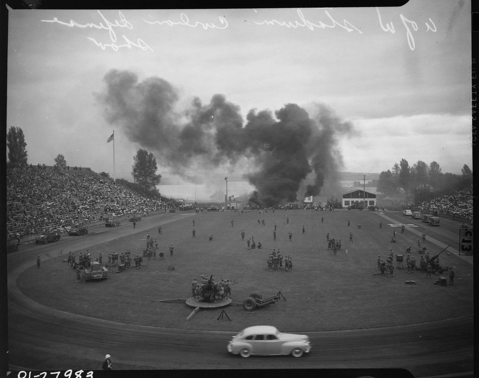Image of Army guns at civil defense demonstration in Husky Stadium, Seattle, 1943