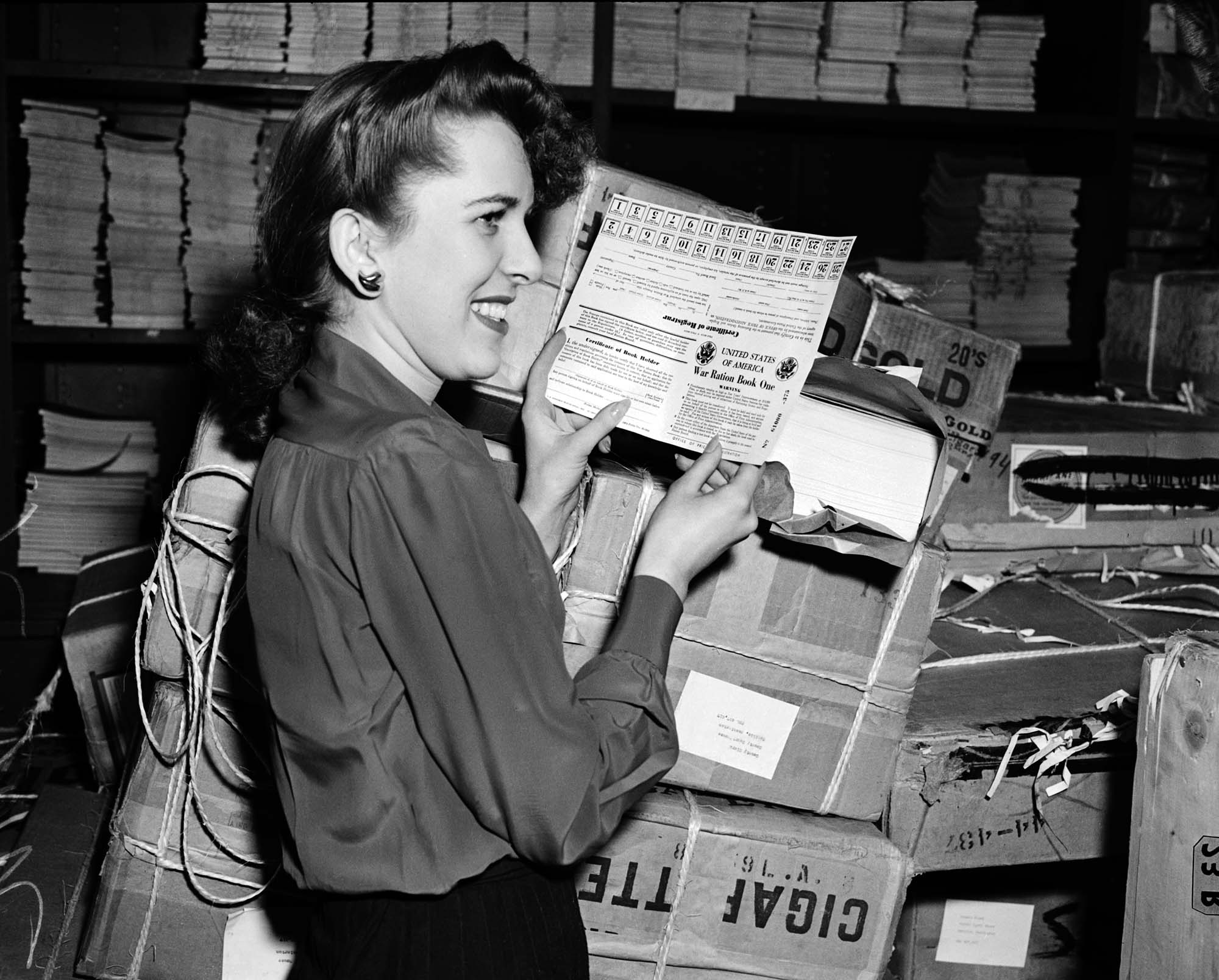 Image of Nola Hines with ration book, Seattle, 1942