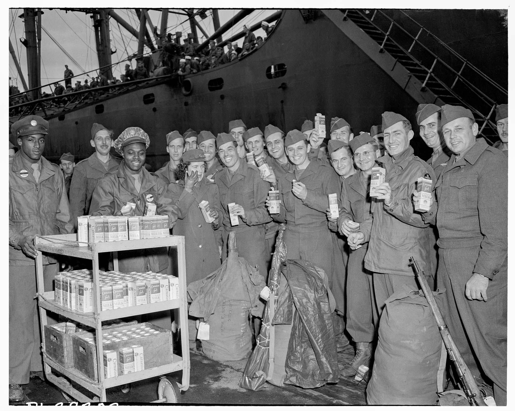 Image of Returning servicemen drinking milk, March 1946