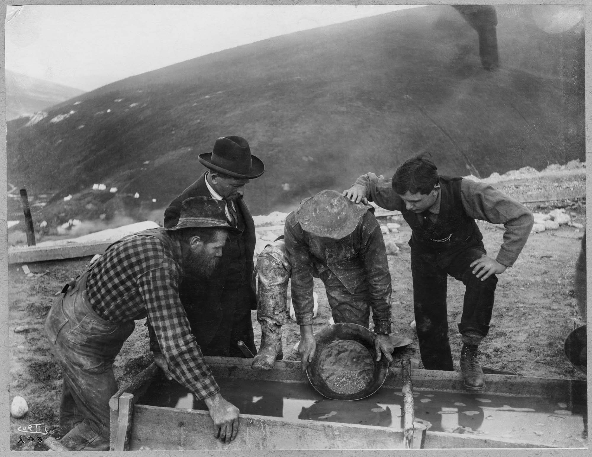 Image of Panning for gold at Gold Hill, Yukon Territory, circa 1898