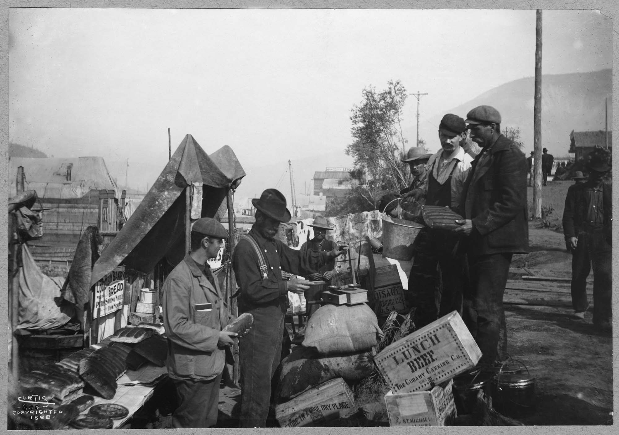 Image of Open-air grocery store in Dawson City, circa 1898