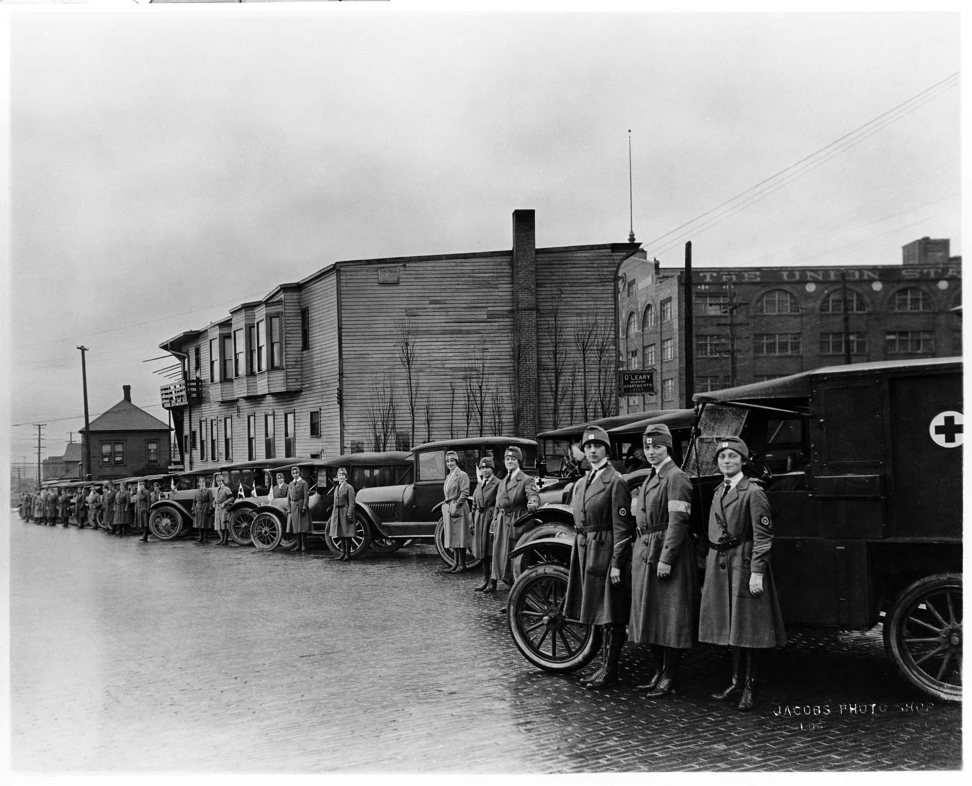 Image of Red Cross ambulance drivers and ambulances, circa 1917