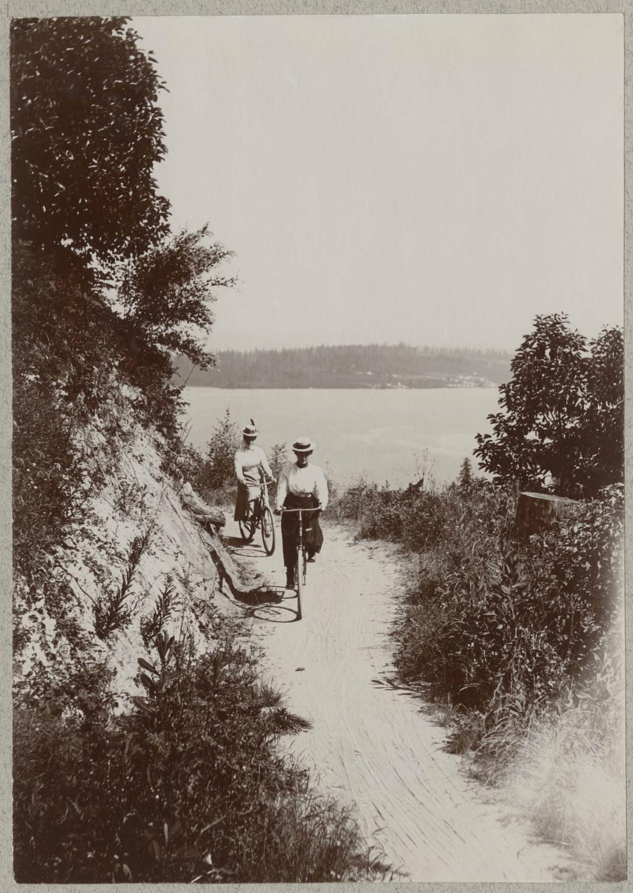 Image of Two women on Lake Washington cycling path, circa 1901
