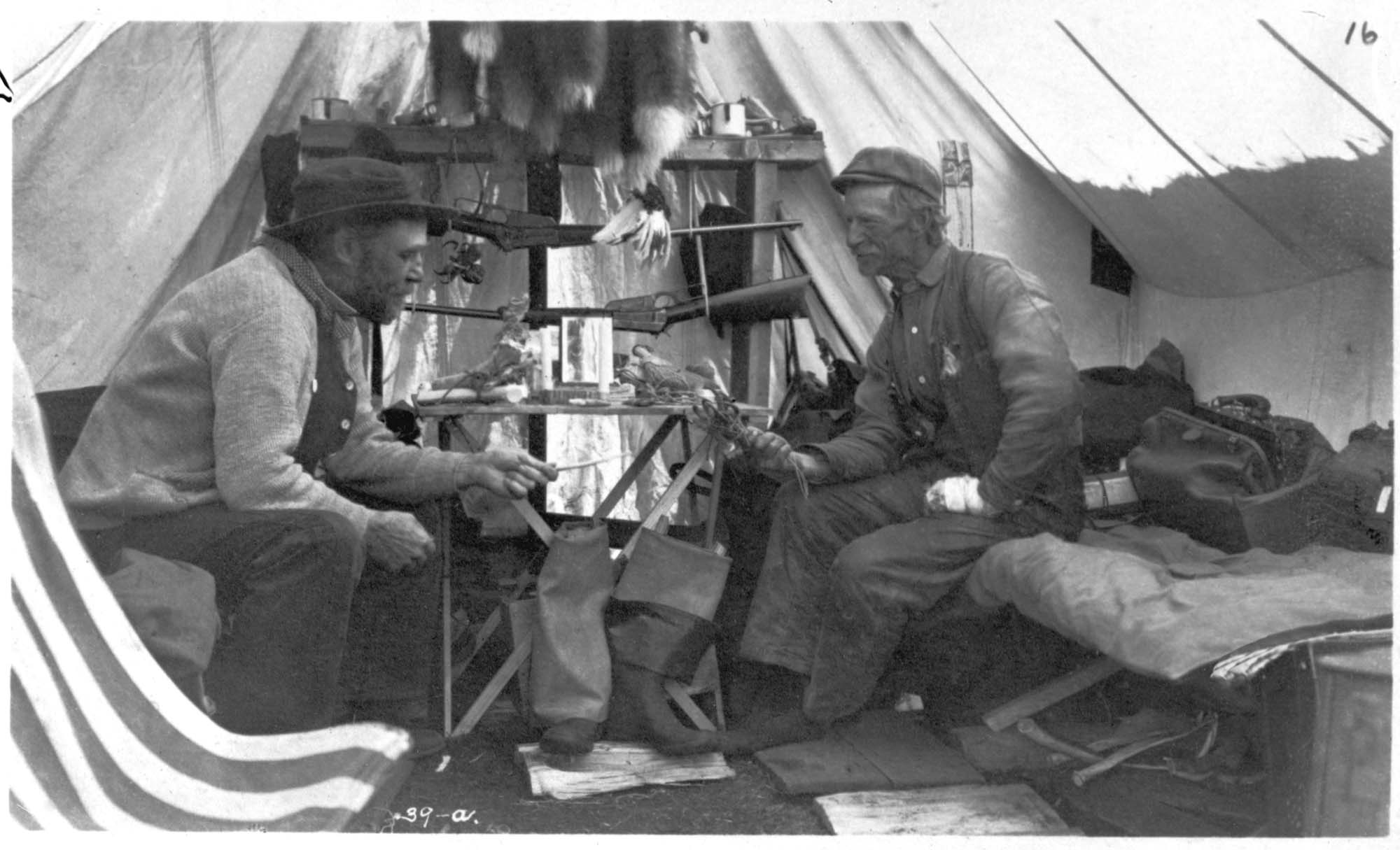 Image of Two gold seekers in their tent, circa 1902
