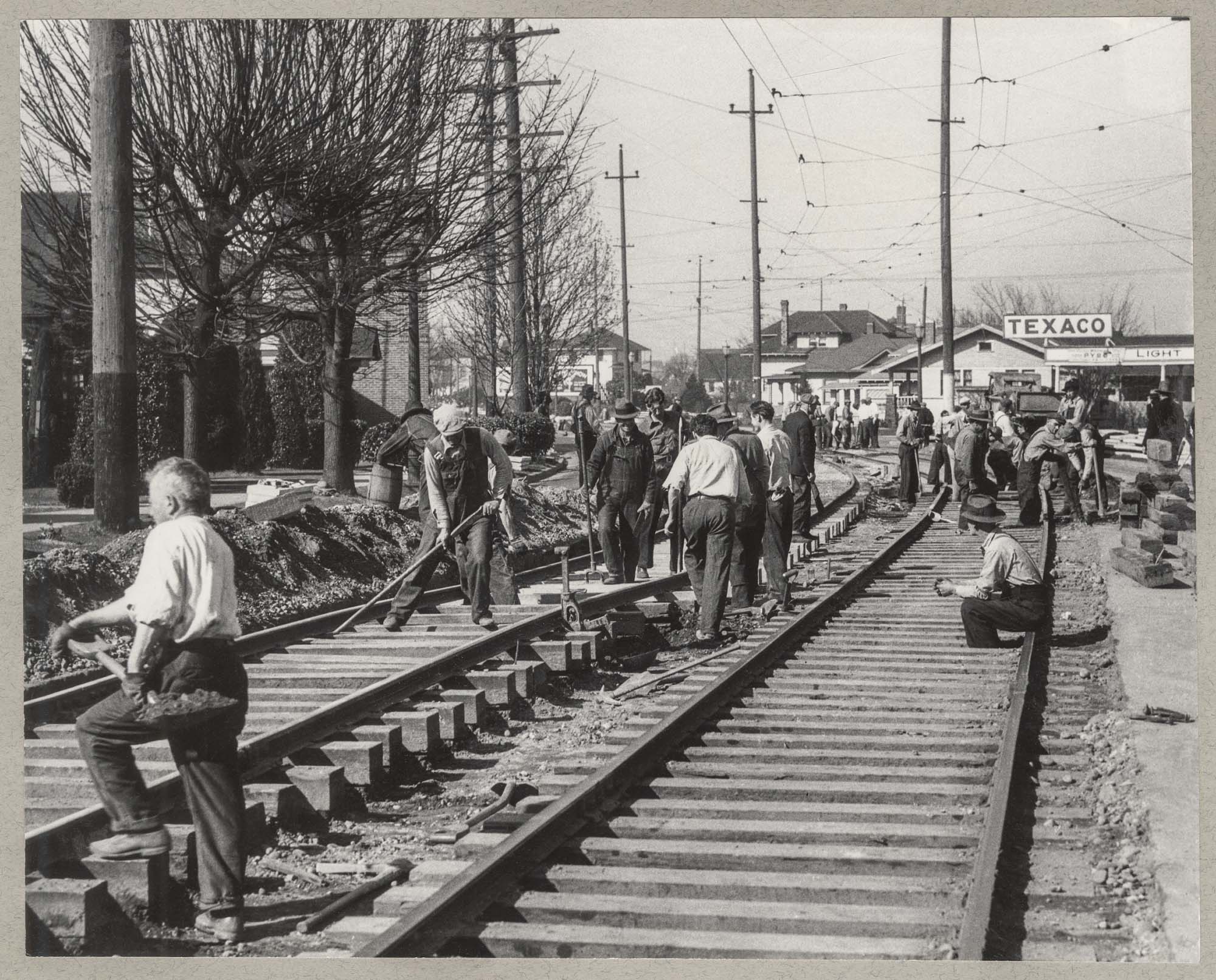 Image of Relief project crew working on streetcar tracks, March 12, 1934