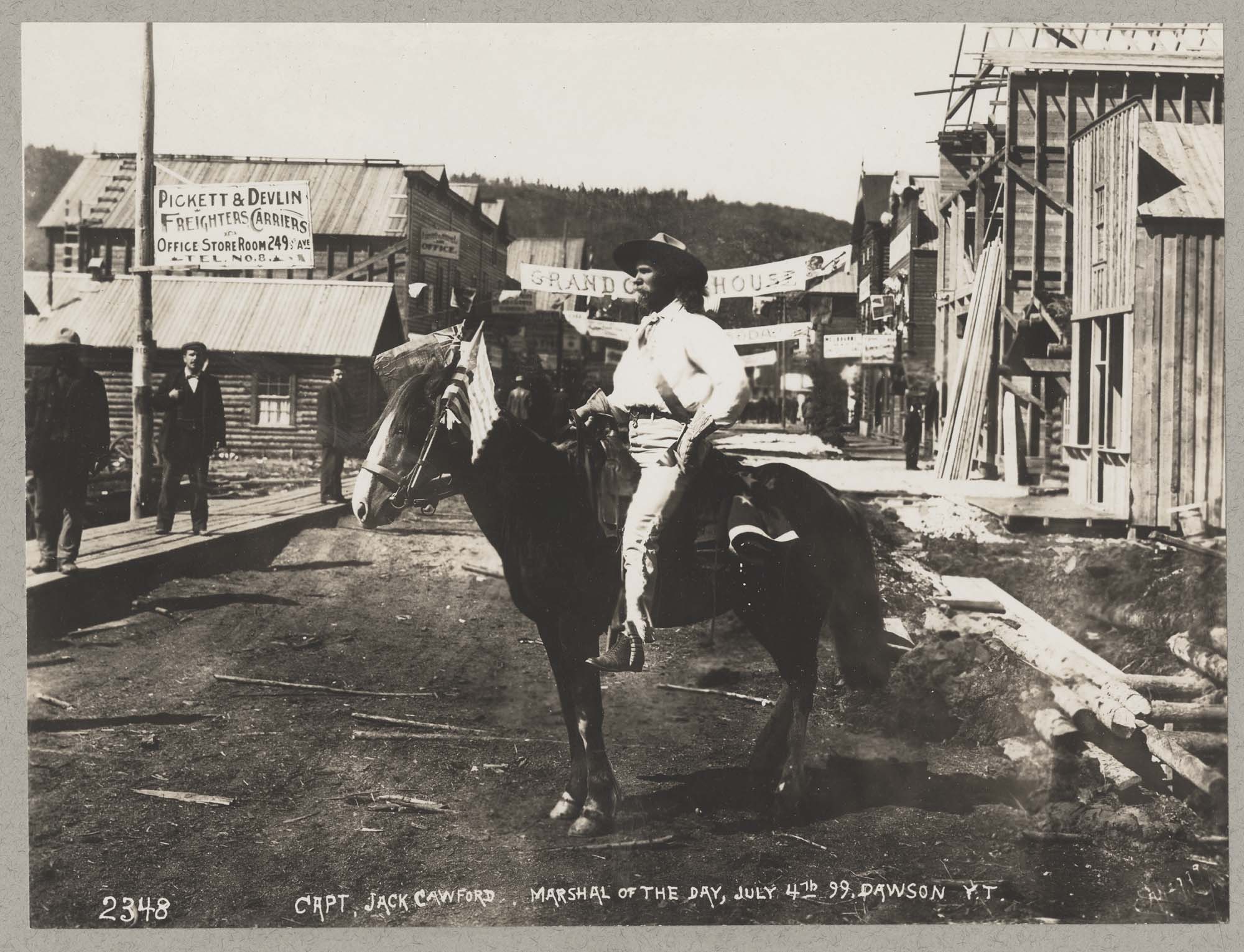 Image of Capt. Jack Cawford on horseback, Dawson, Yukon Territory, July 4, 1899