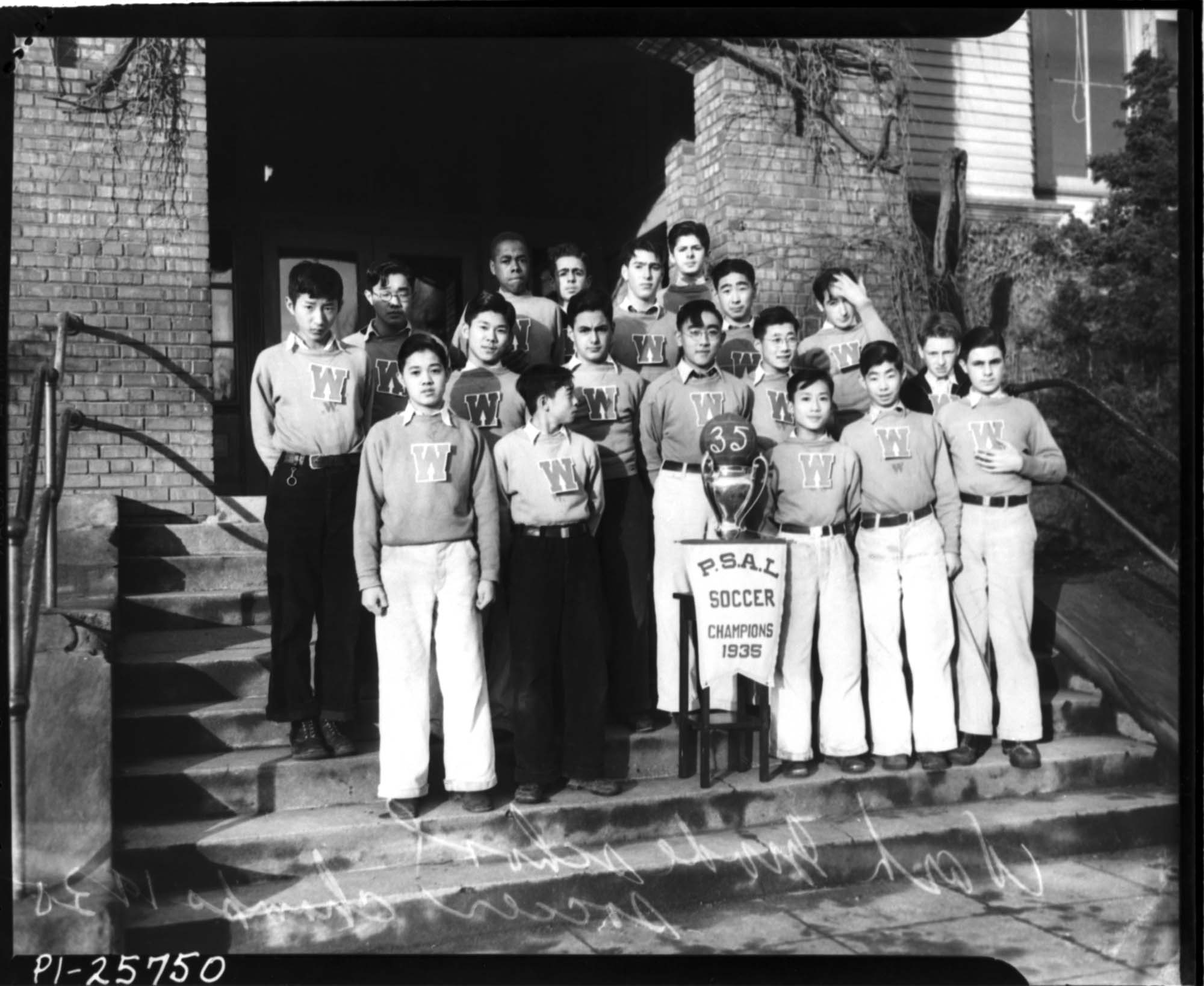 Image of Soccer team with championship pennant, January, 1936