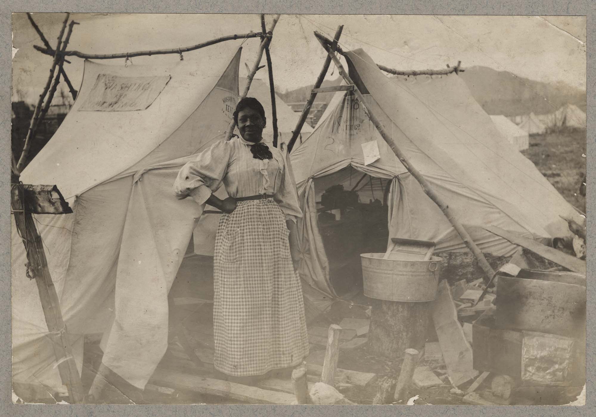 Image of Laundry woman during gold rush, circa 1902