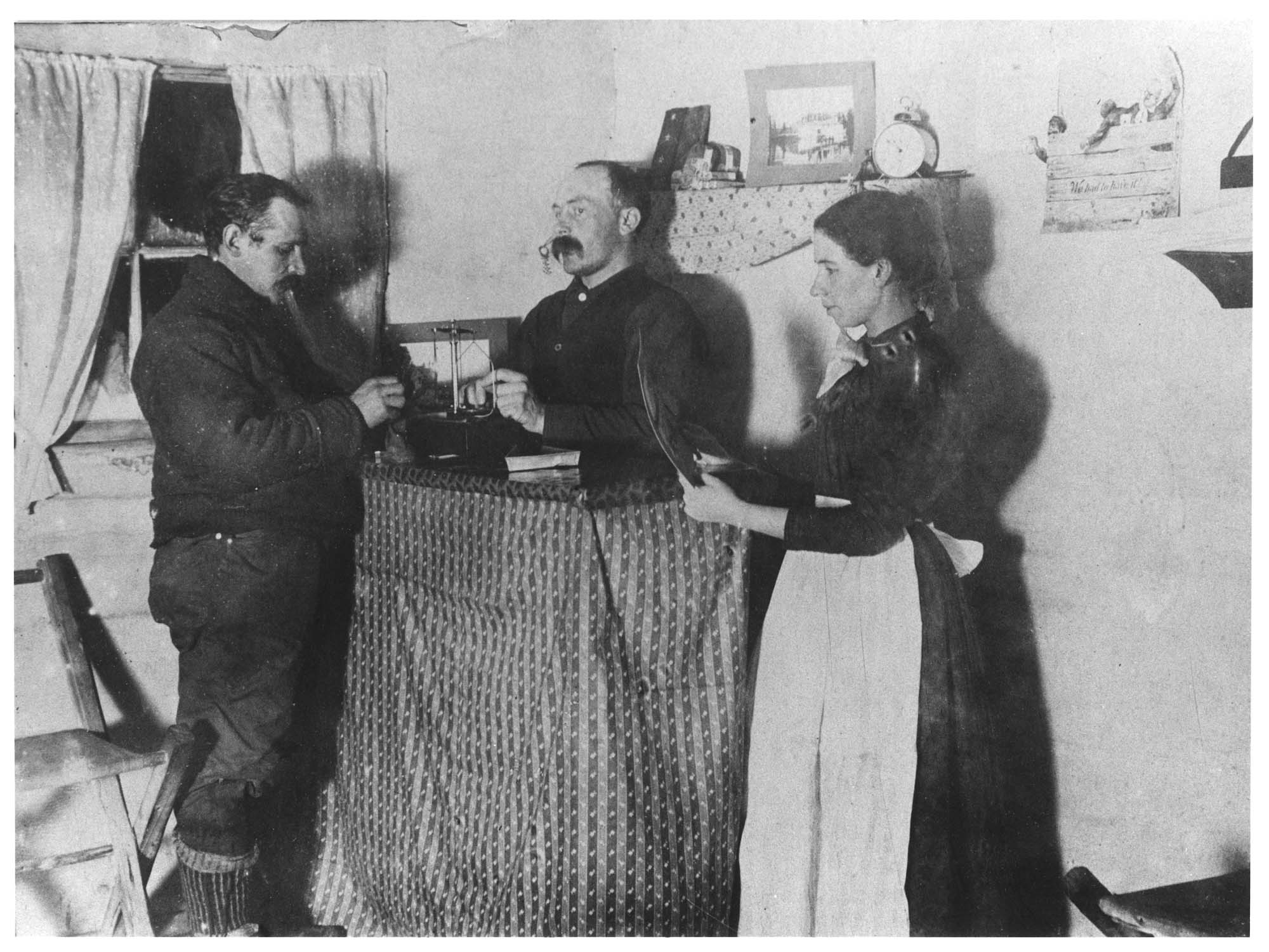 Image of Weighing gold at the Jo Jo Hotel, circa 1900