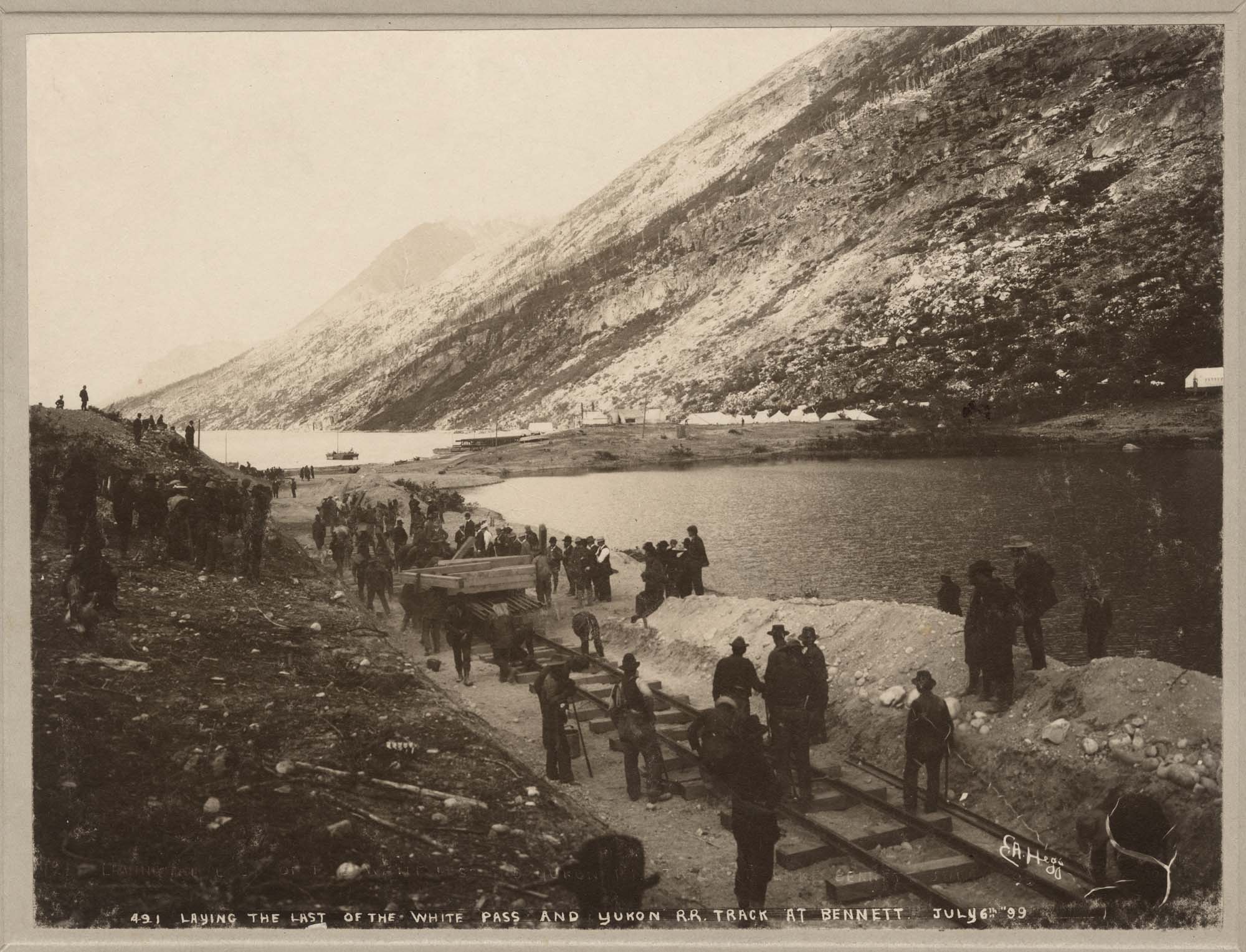 Image of White Pass & Yukon, laying at Bennett, track, 1899