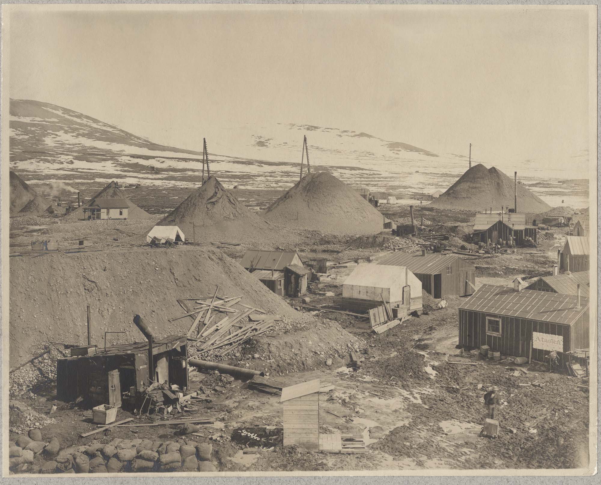 Image of Cabins and mining activities near Nome, circa 1905