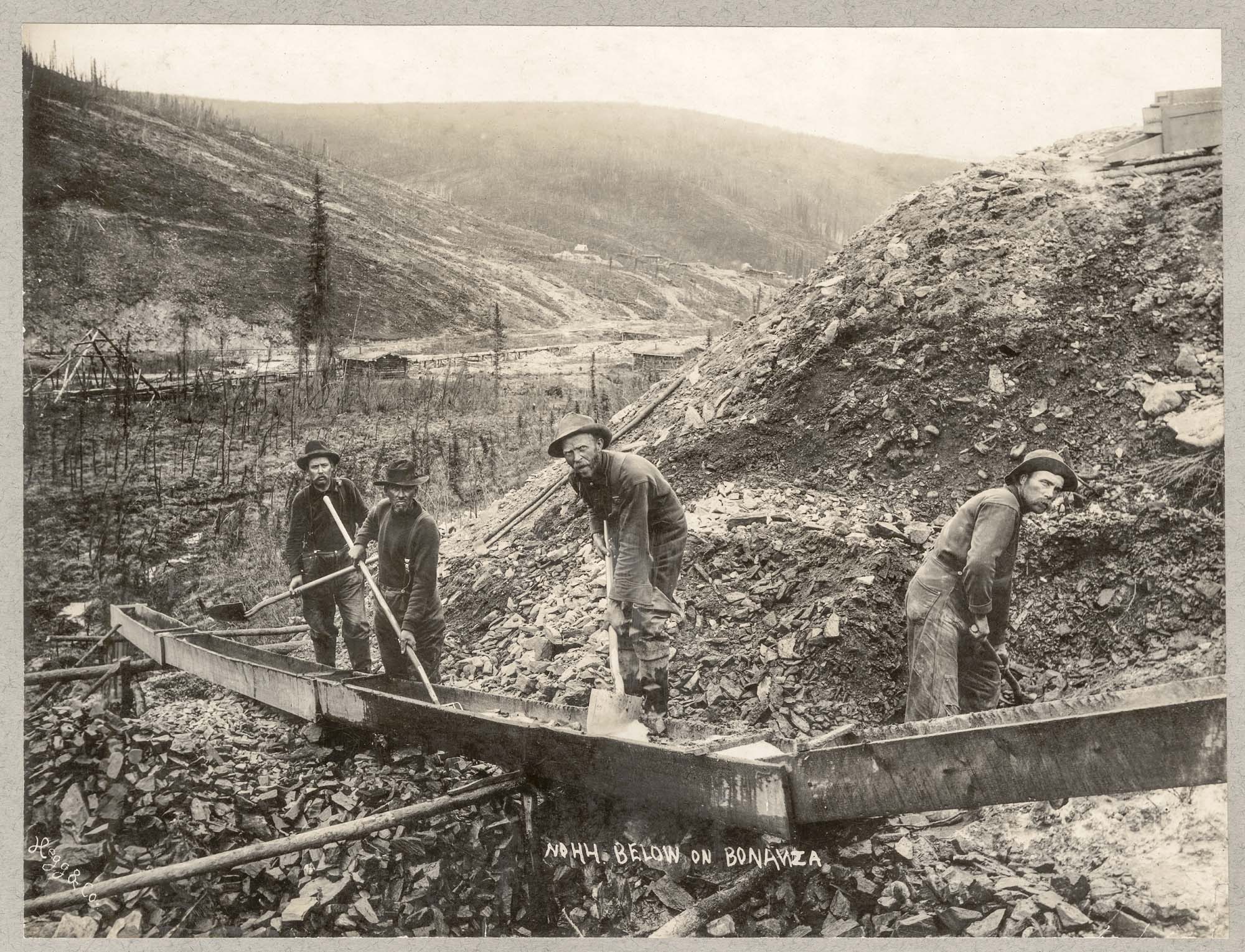Image of Manning a sluice at Bonanza Creek, circa 1898