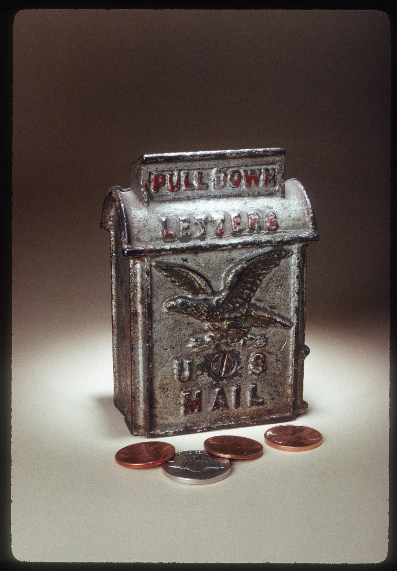 Image of Still bank shaped like an upright mailbox, ca. 1914