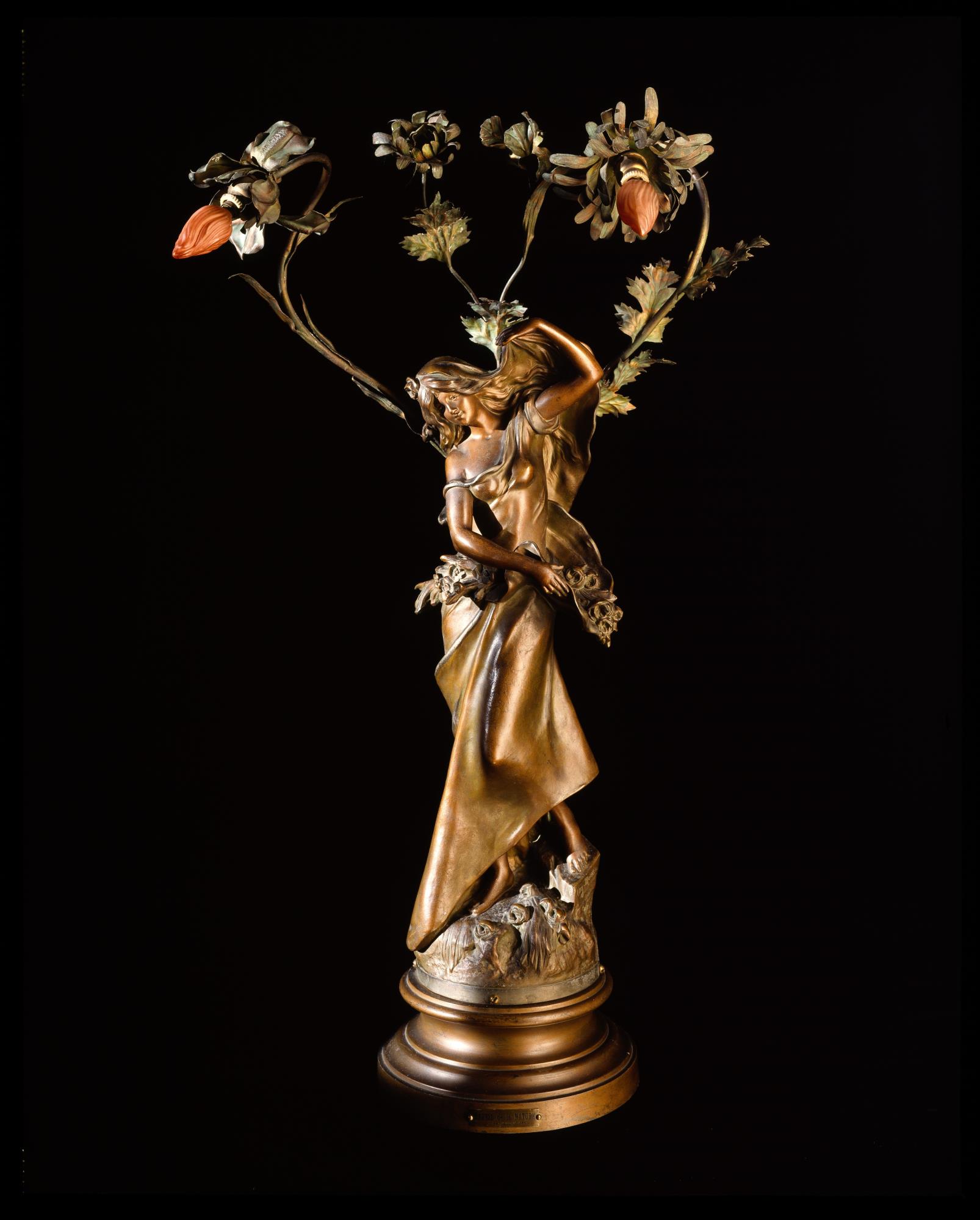 Image of Ornate brass statue lamp, 