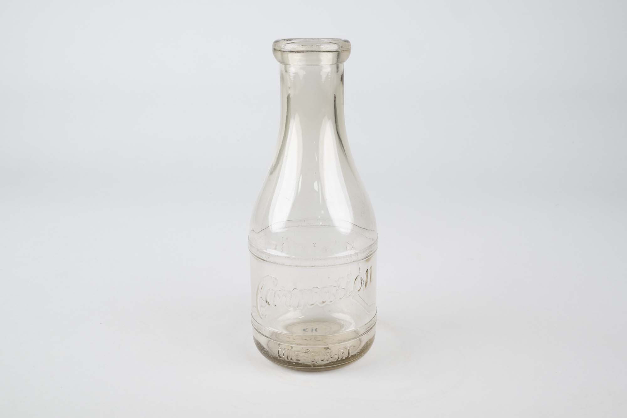 Image of Carnation Milk bottle used by William Myers in his butcher shop on 2nd and Cherry, and in Georgetown, ca. 1900