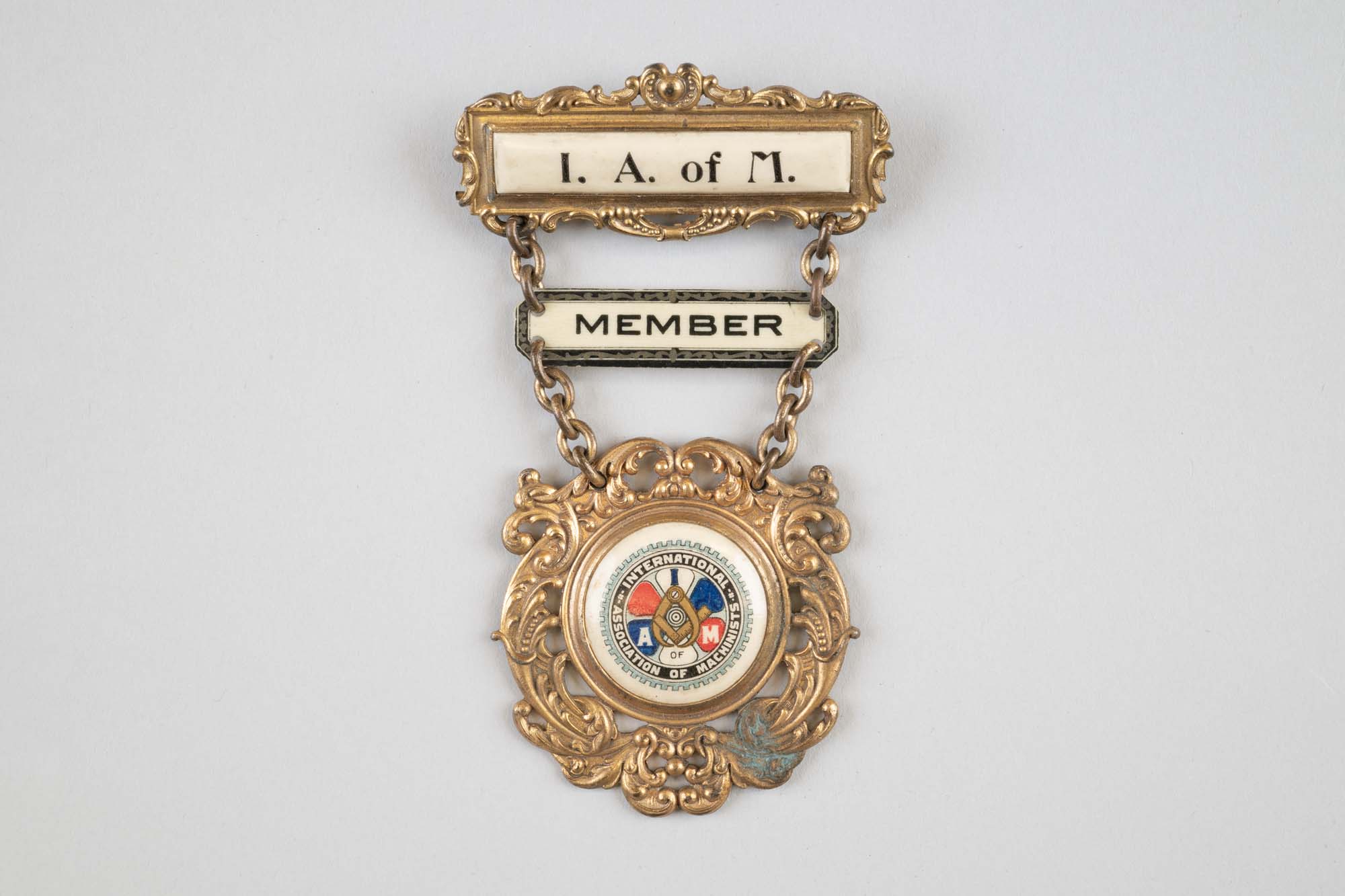 Image of Badge from the International Association of Machinists, ca. 1920