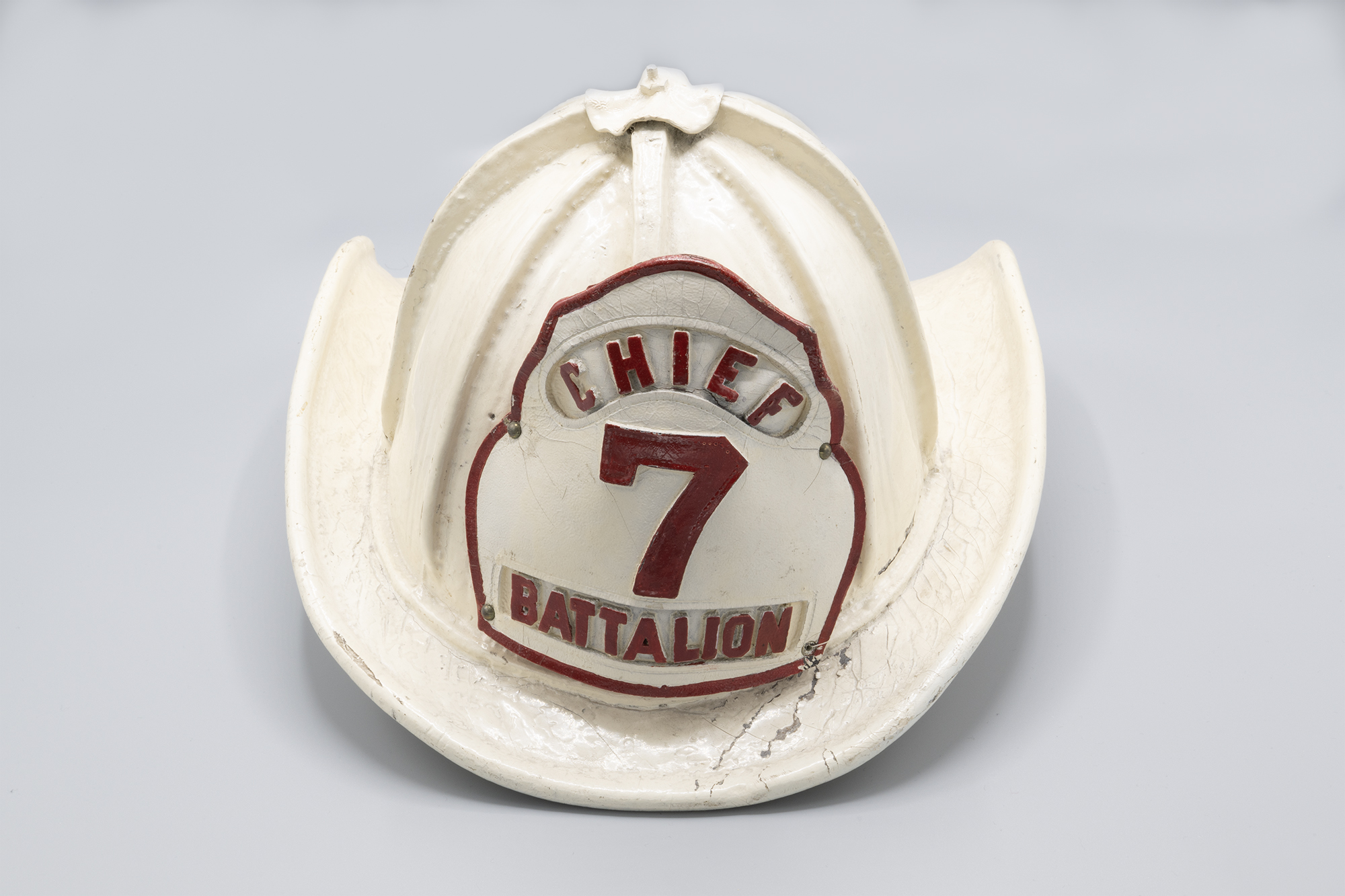 Image of Chief Battalion 7 fireman's helmet presented to Olympic Hotel manager Frank Hull, 1936