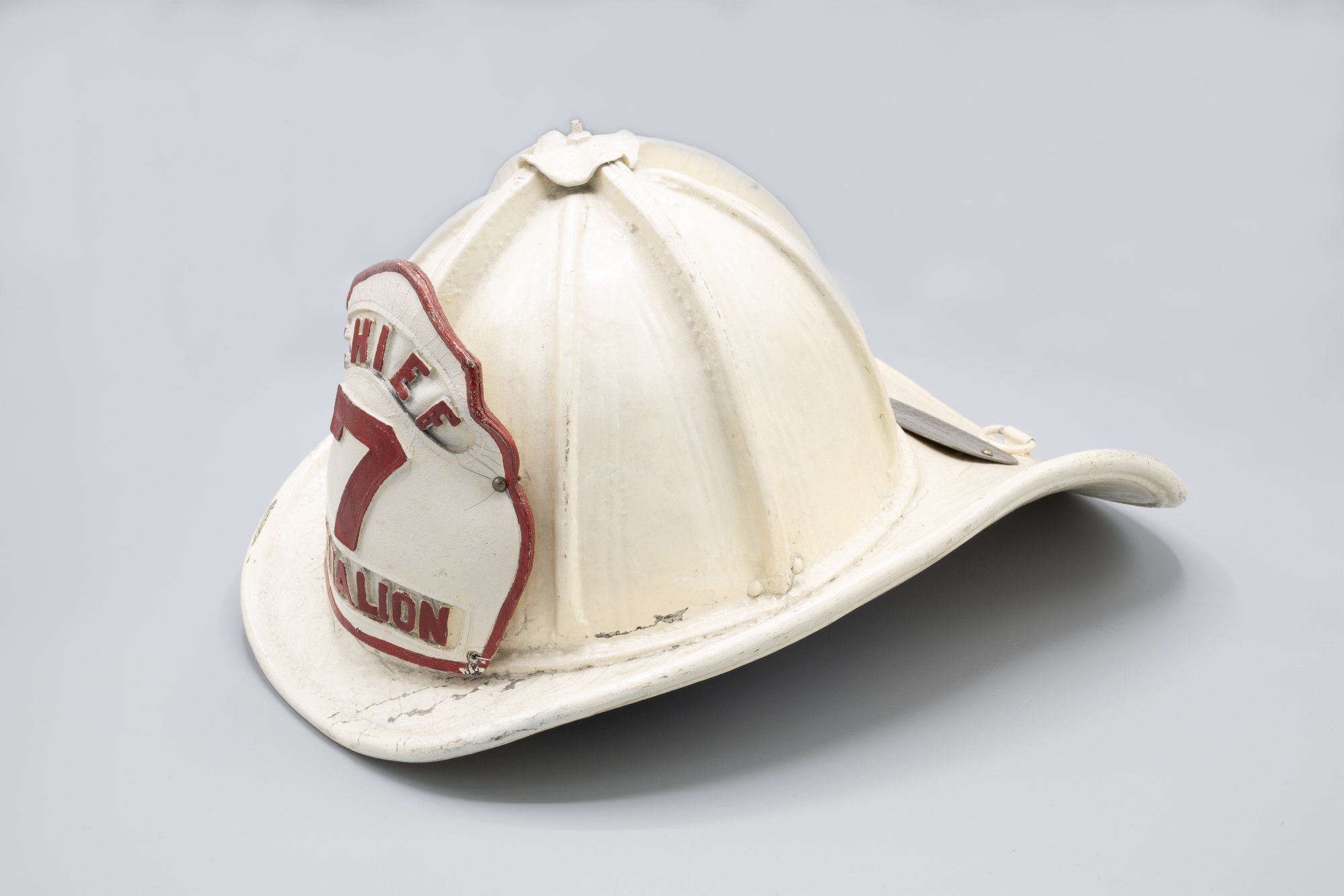 Image of Chief Battalion 7 fireman's helmet presented to Olympic Hotel manager Frank Hull, 1936