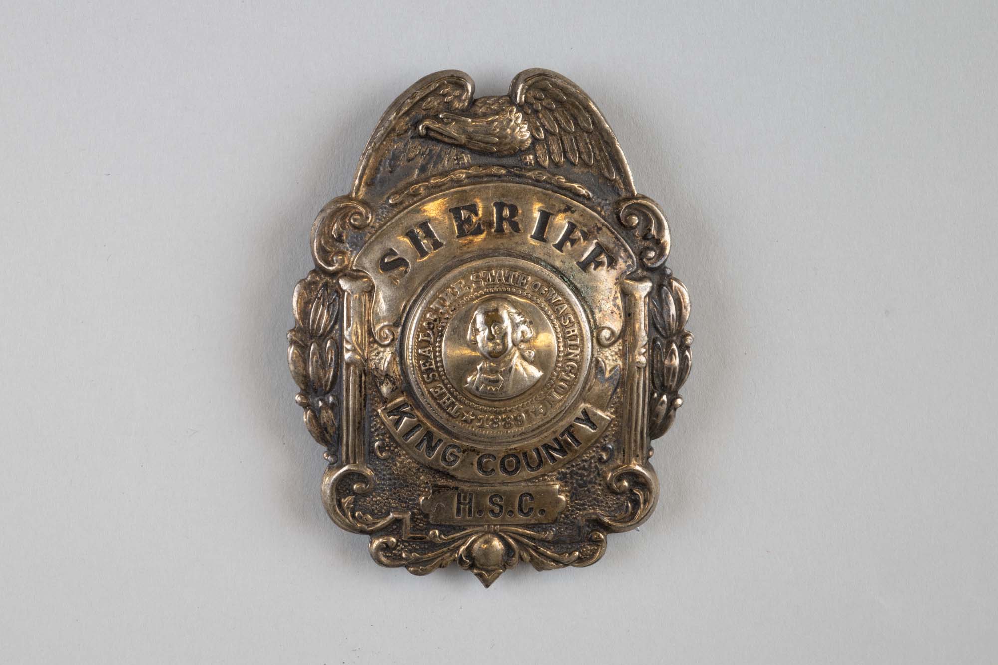 Image of King County Sheriff badge worn by Harlan S. Callahan,1943-1955