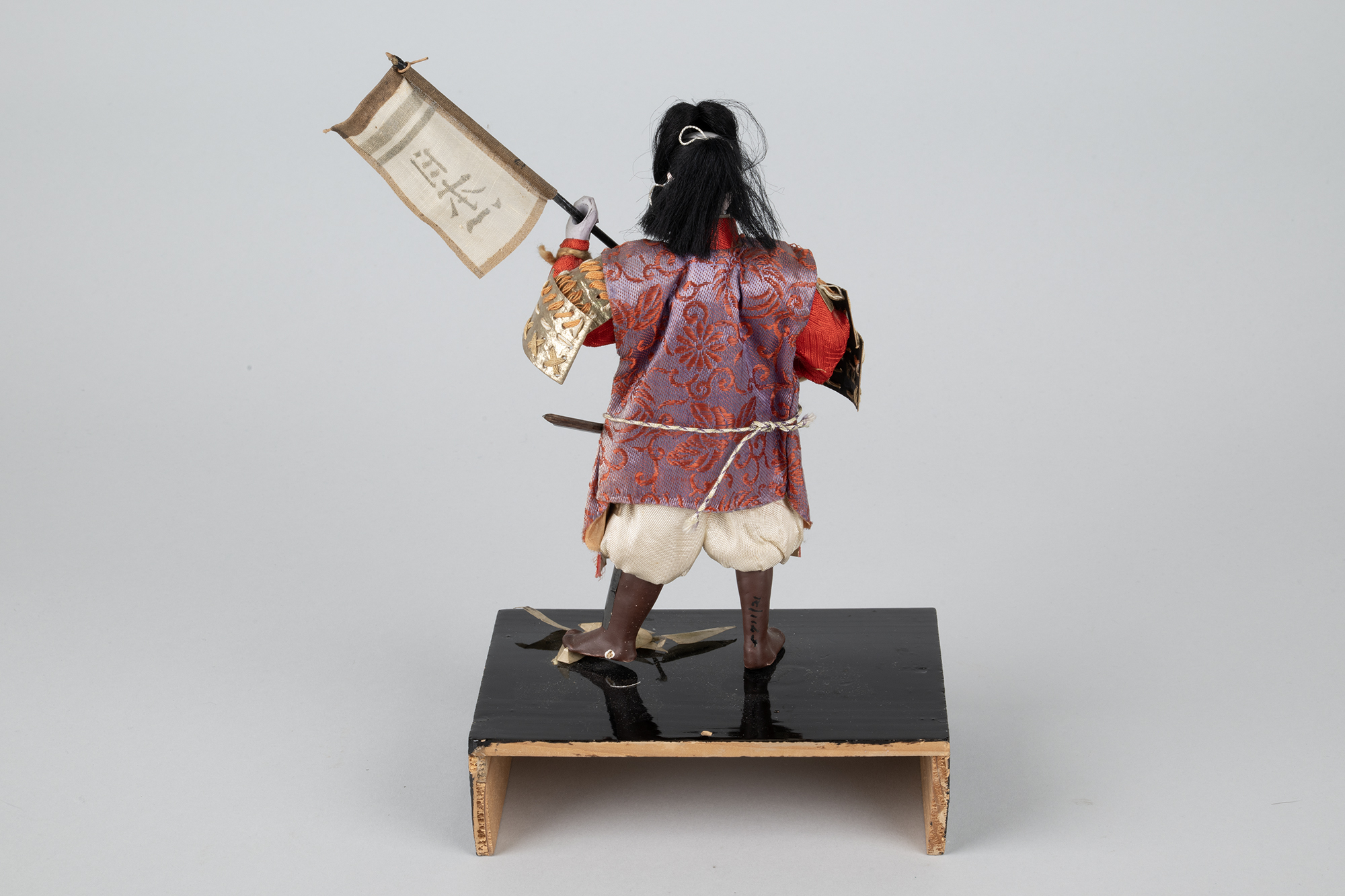 Image of Samurai doll, likely Momotaro, from Boys’ Day, ca. 1930-1940