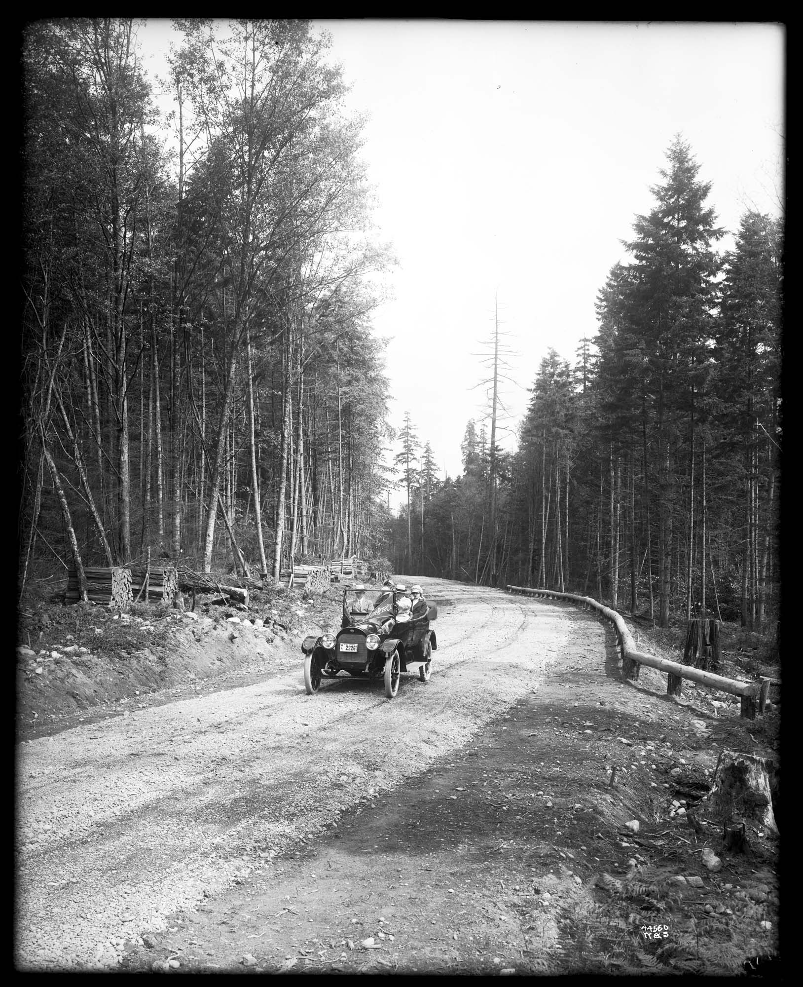 Image of Car on highway between Seattle and Tacoma, 1916