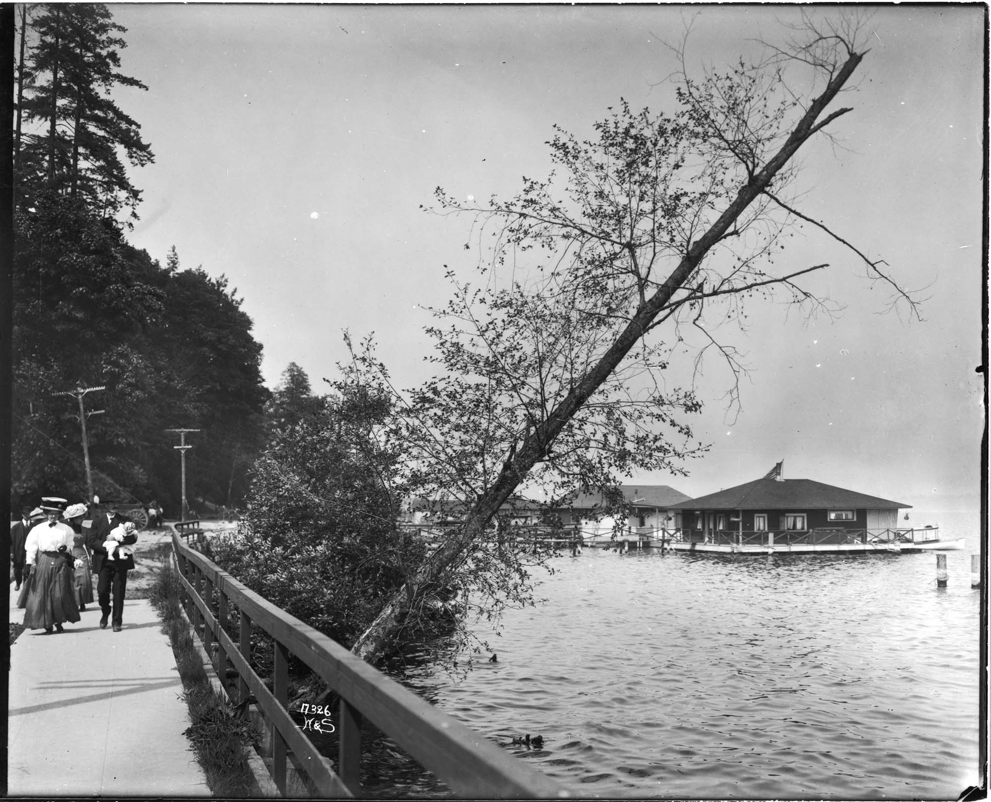 Image of People strolling along waterfront in Leschi Park, Seattle, circa 1910